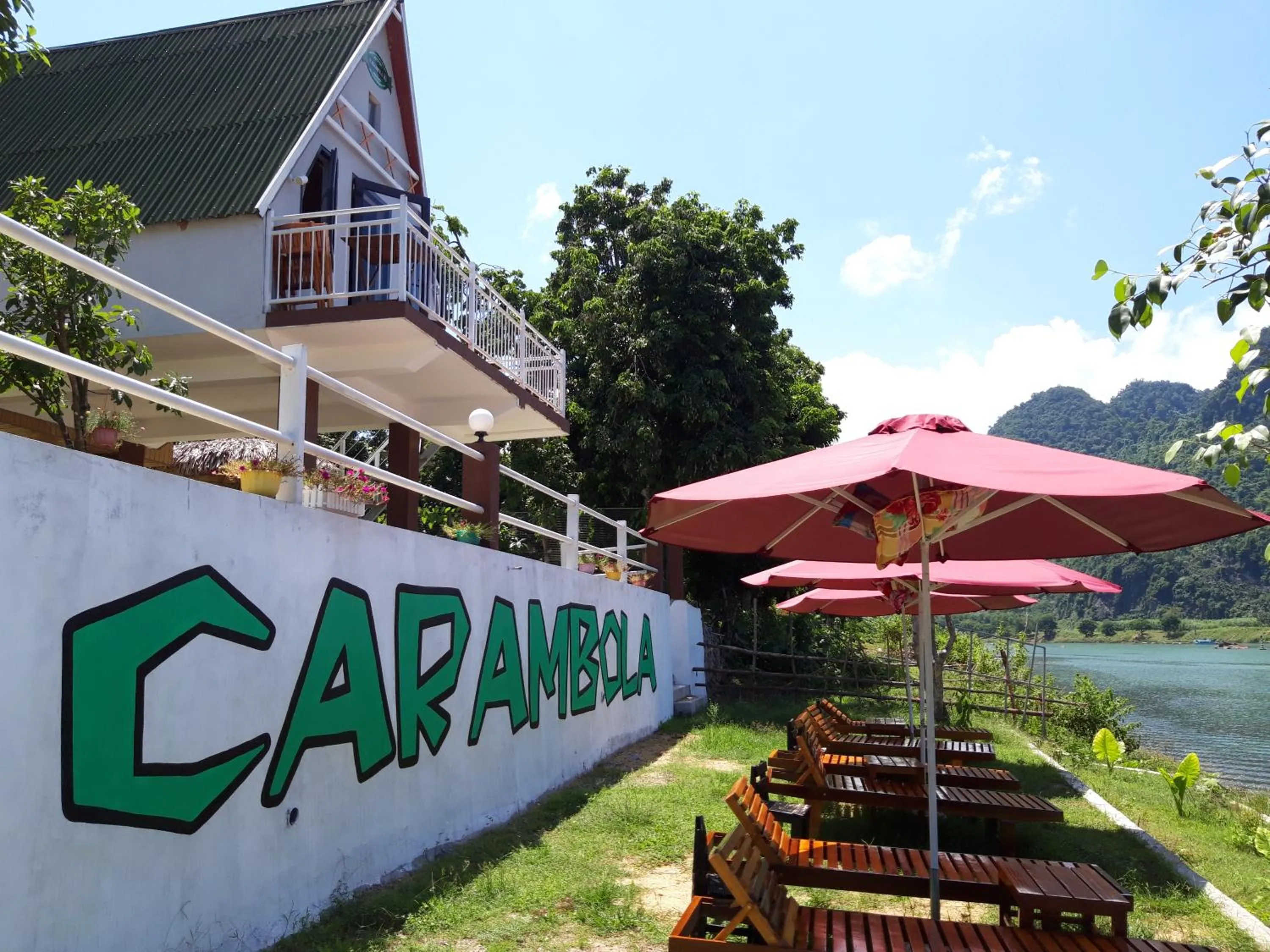 Property logo or sign in Carambola Bungalow