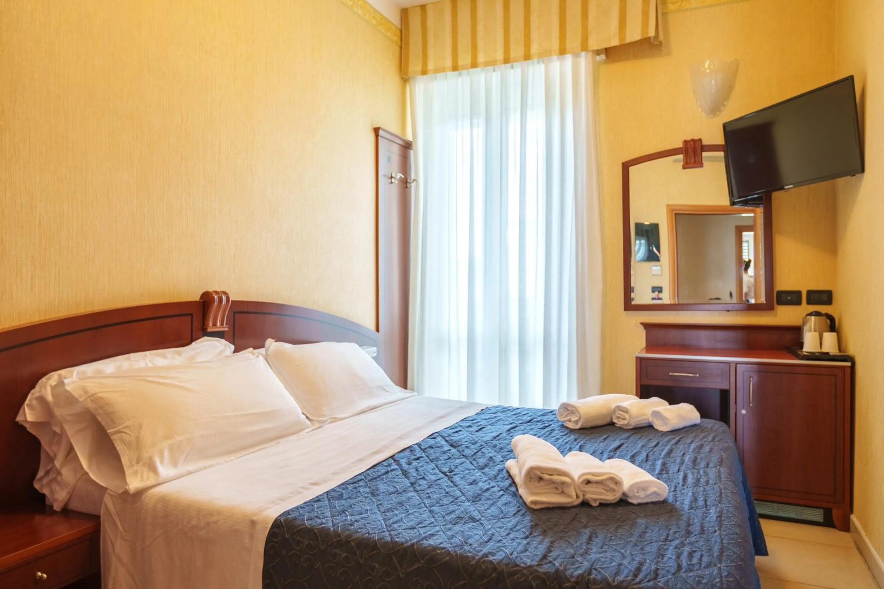 Bed in Hotel Rex Rimini