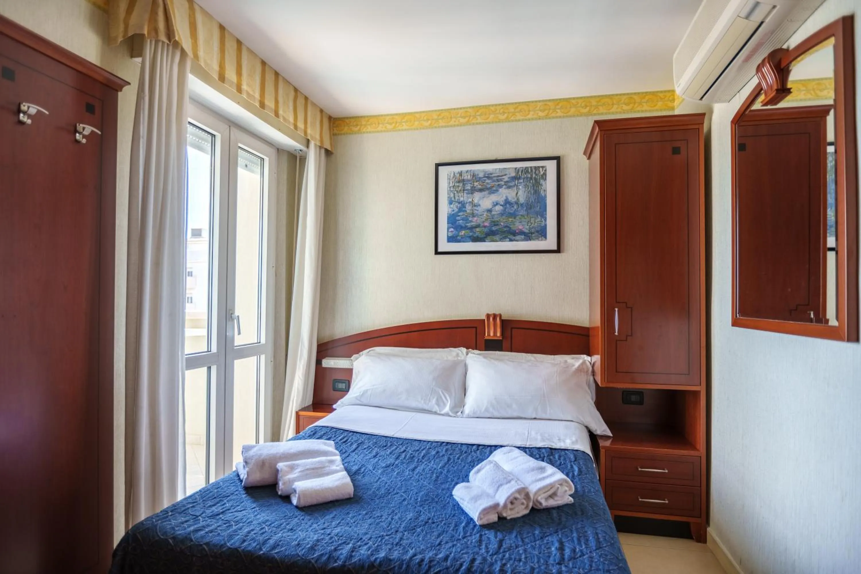 Bed in Hotel Rex Rimini