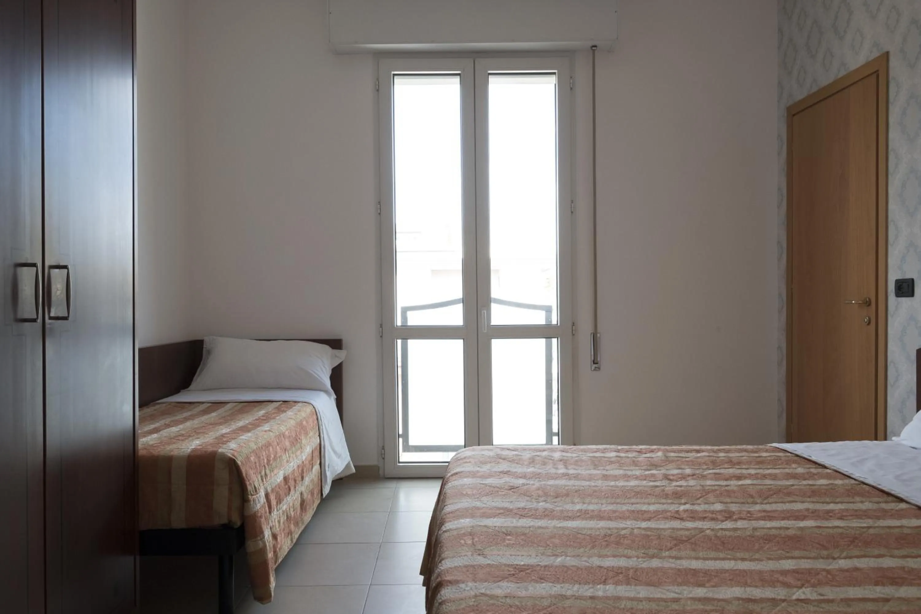 Bed in Hotel Rex Rimini