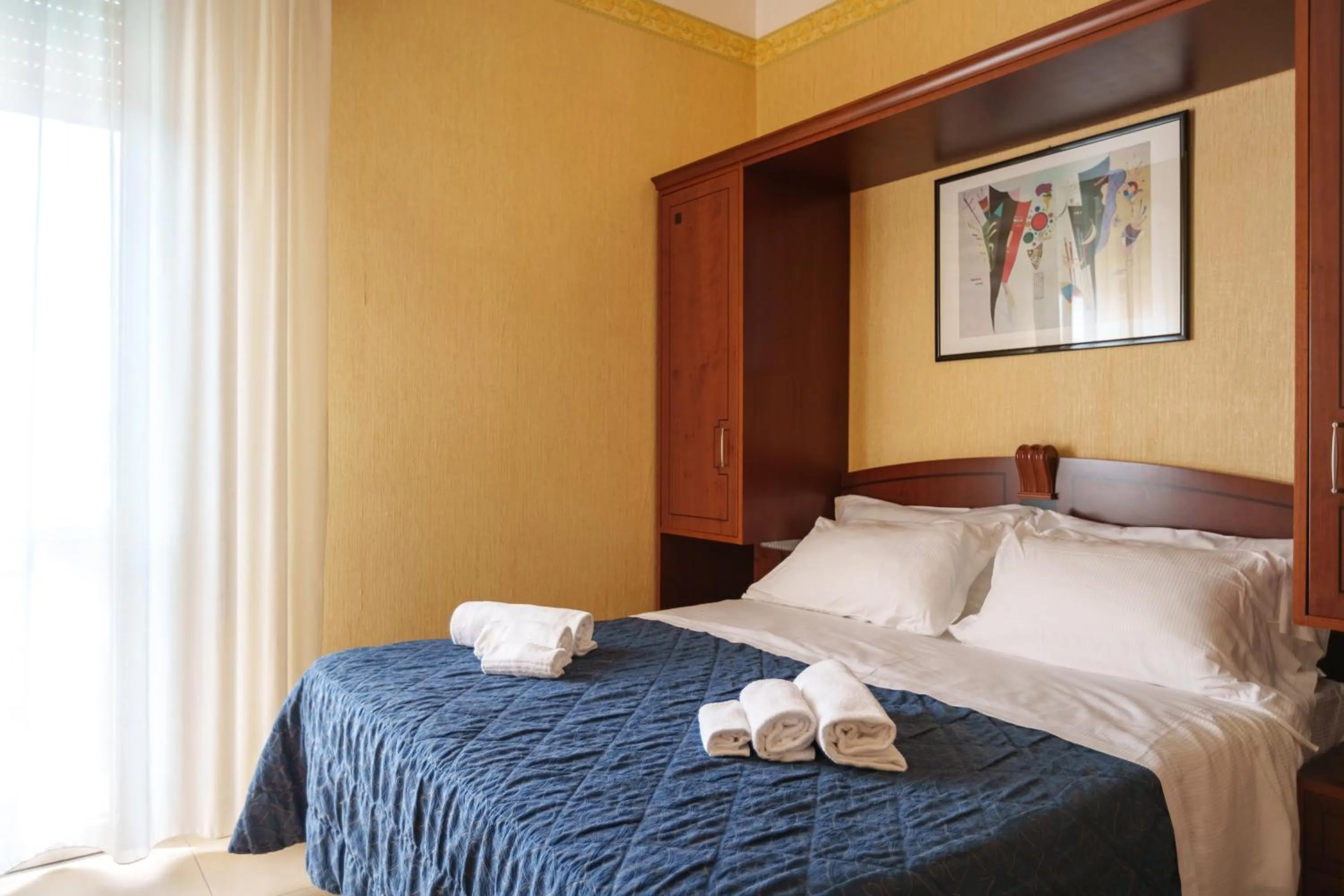 Bed in Hotel Rex Rimini