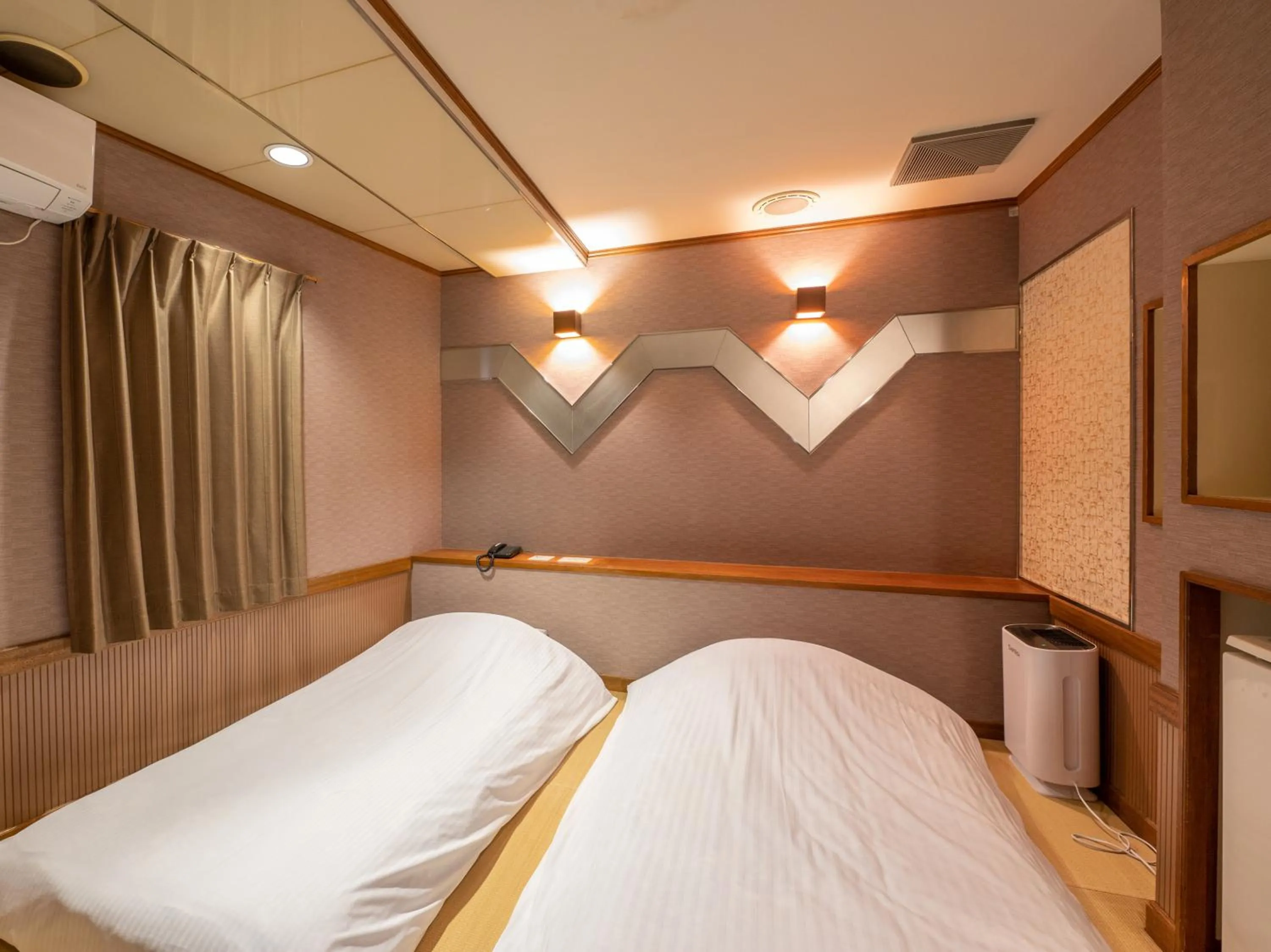 Bed in Tabist Hotel Rakuserina