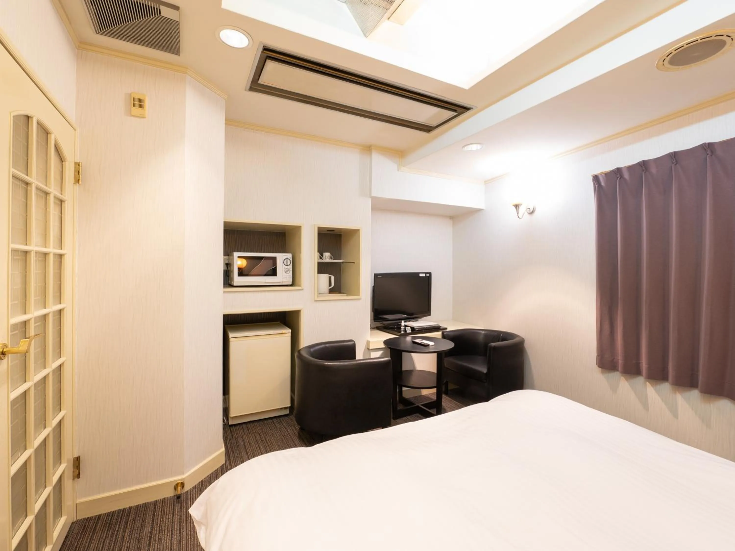 Bed in Tabist Hotel Rakuserina