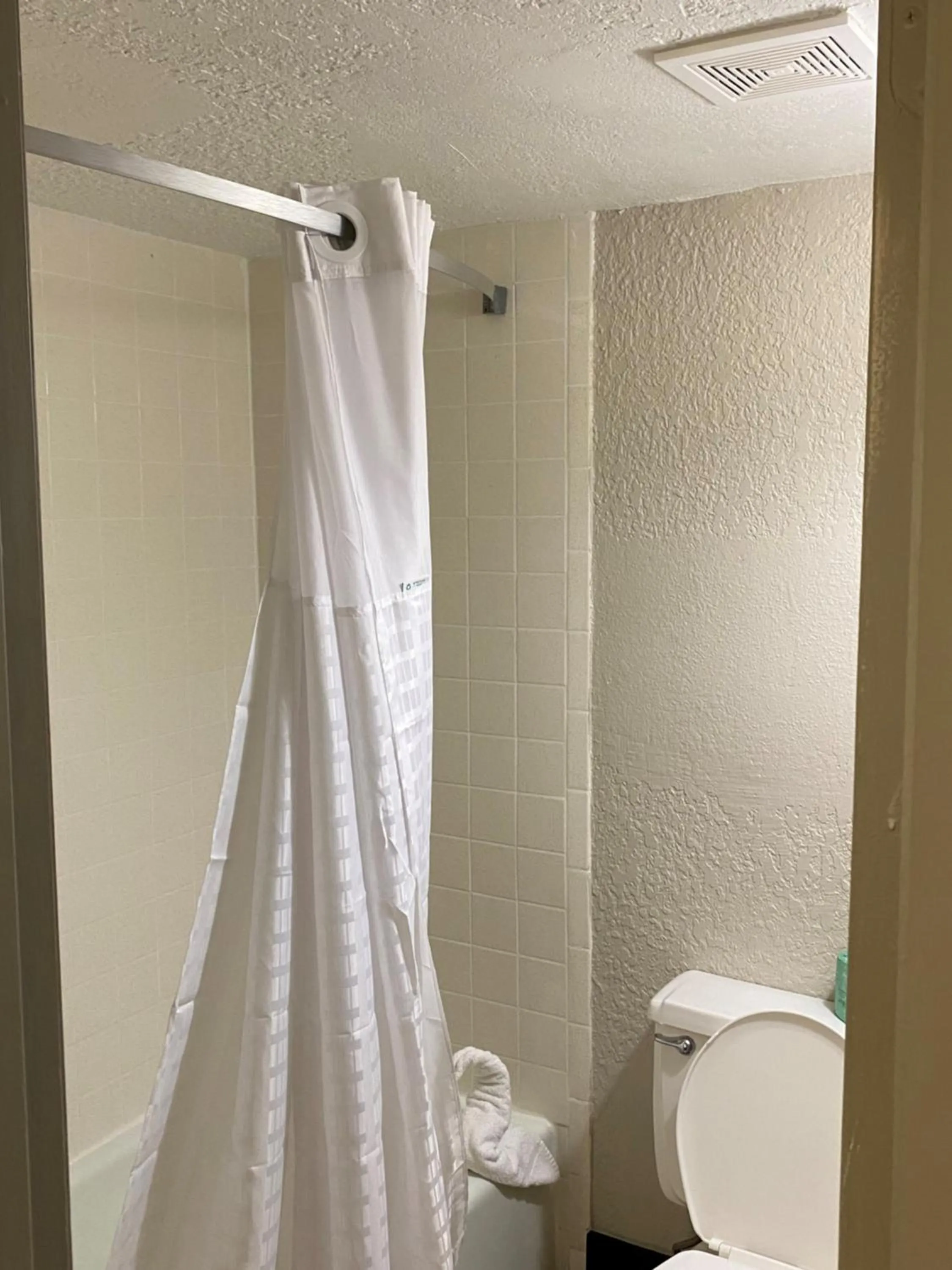 Shower in Days Inn & Suites by Wyndham Fort Pierce Midtown