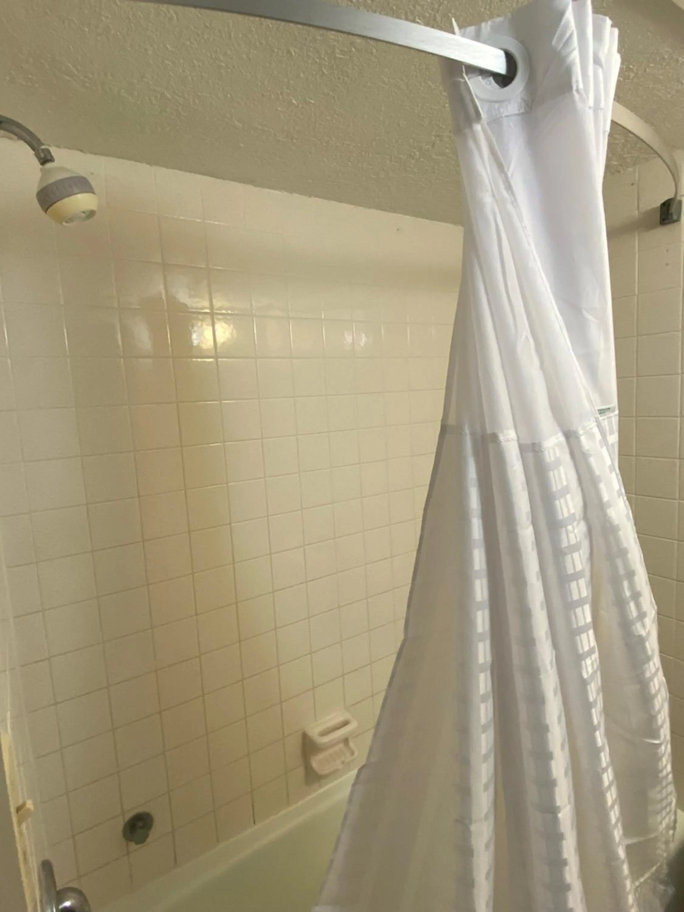 Shower in Days Inn & Suites by Wyndham Fort Pierce Midtown