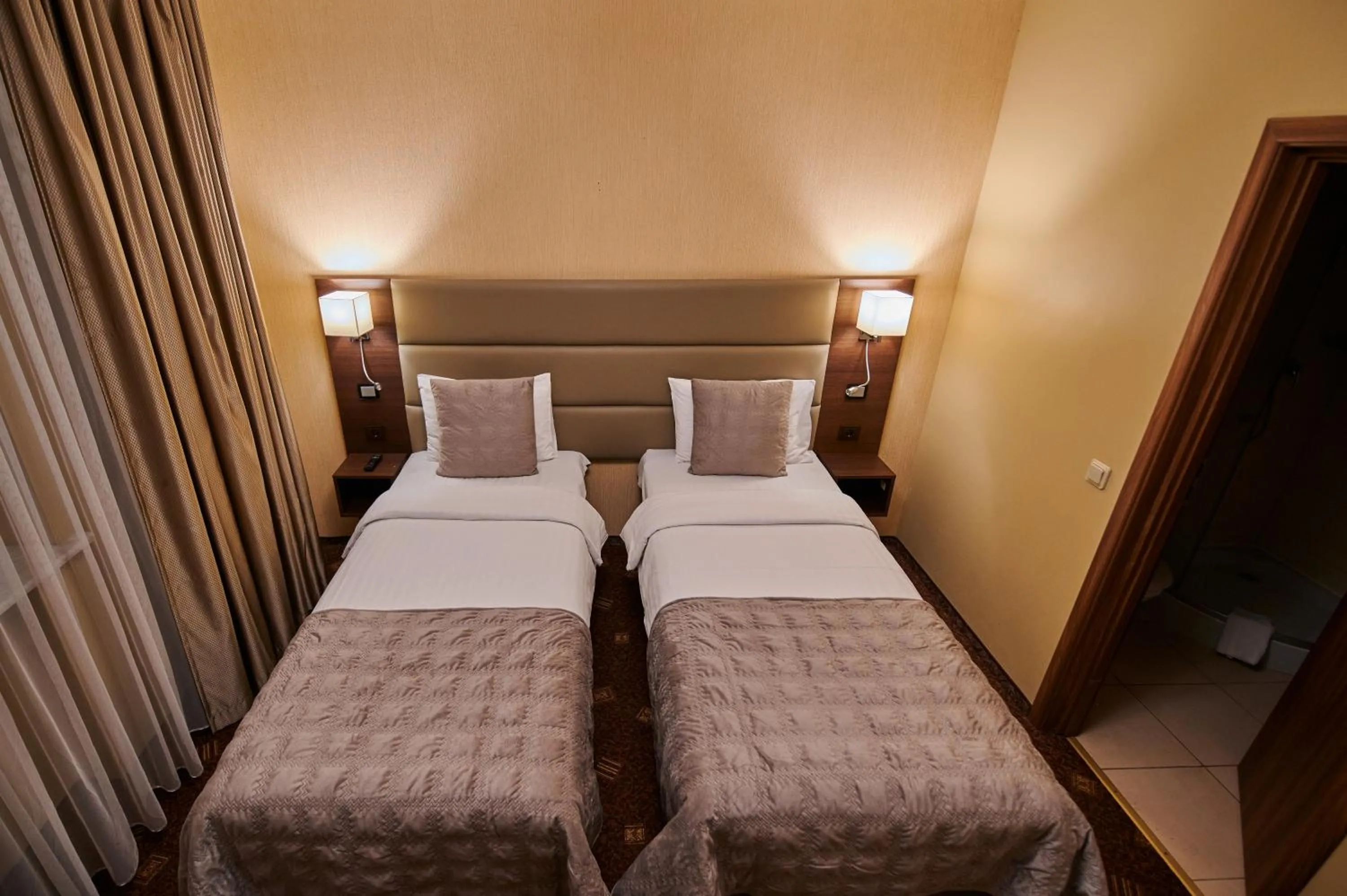 Bed in Olympus Hotel