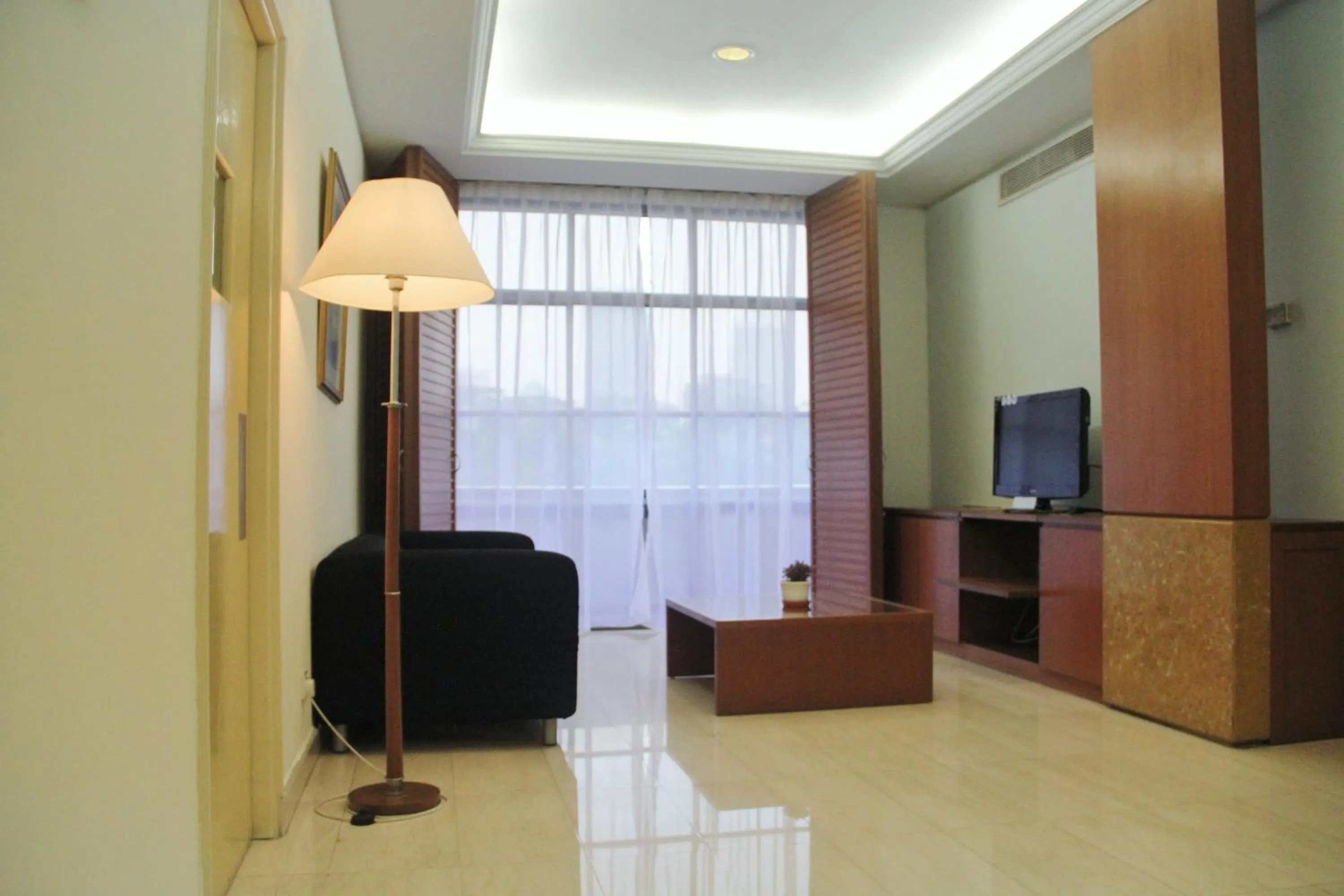 Living room in The Maple Suite