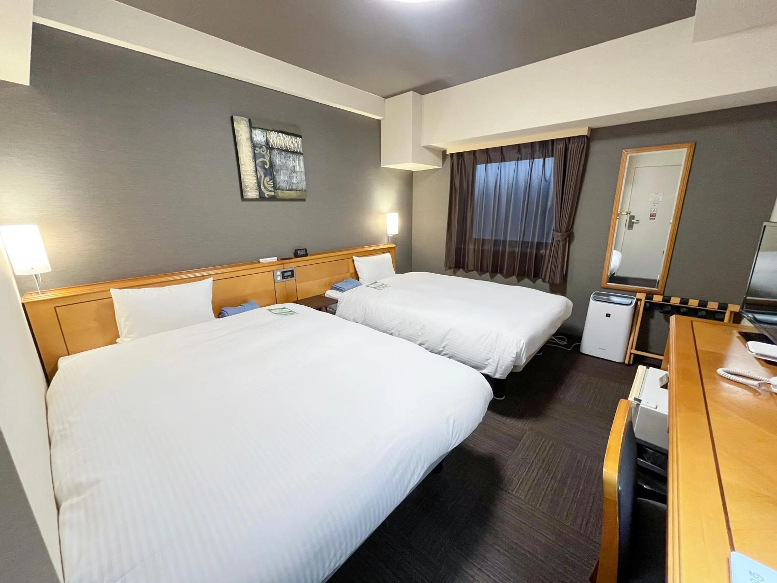 Photo of the whole room, Bed in Hotel Route-Inn Naha Asahibashi Eki Higashi