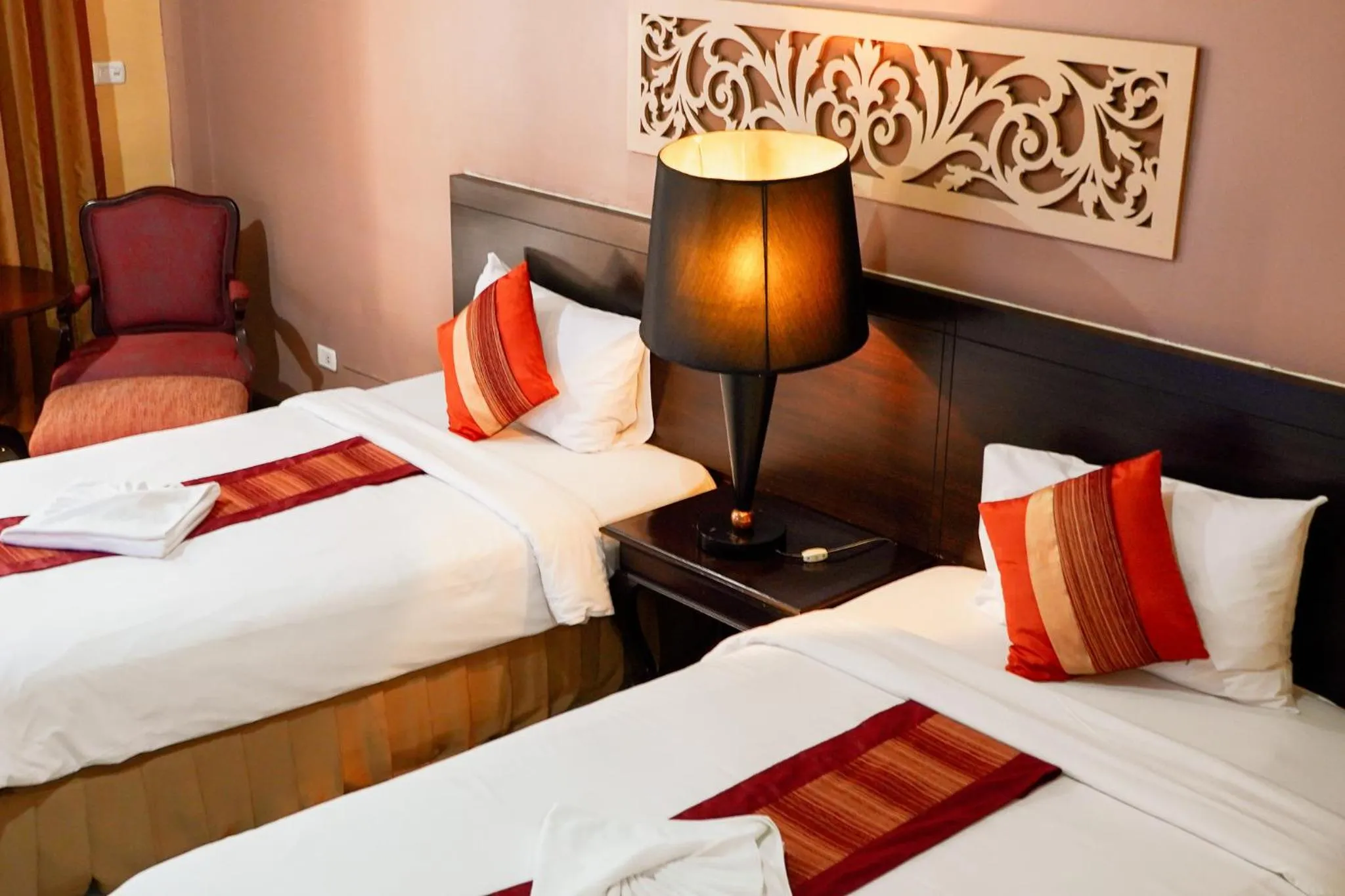 Bed in Piman Garden Boutique Hotel