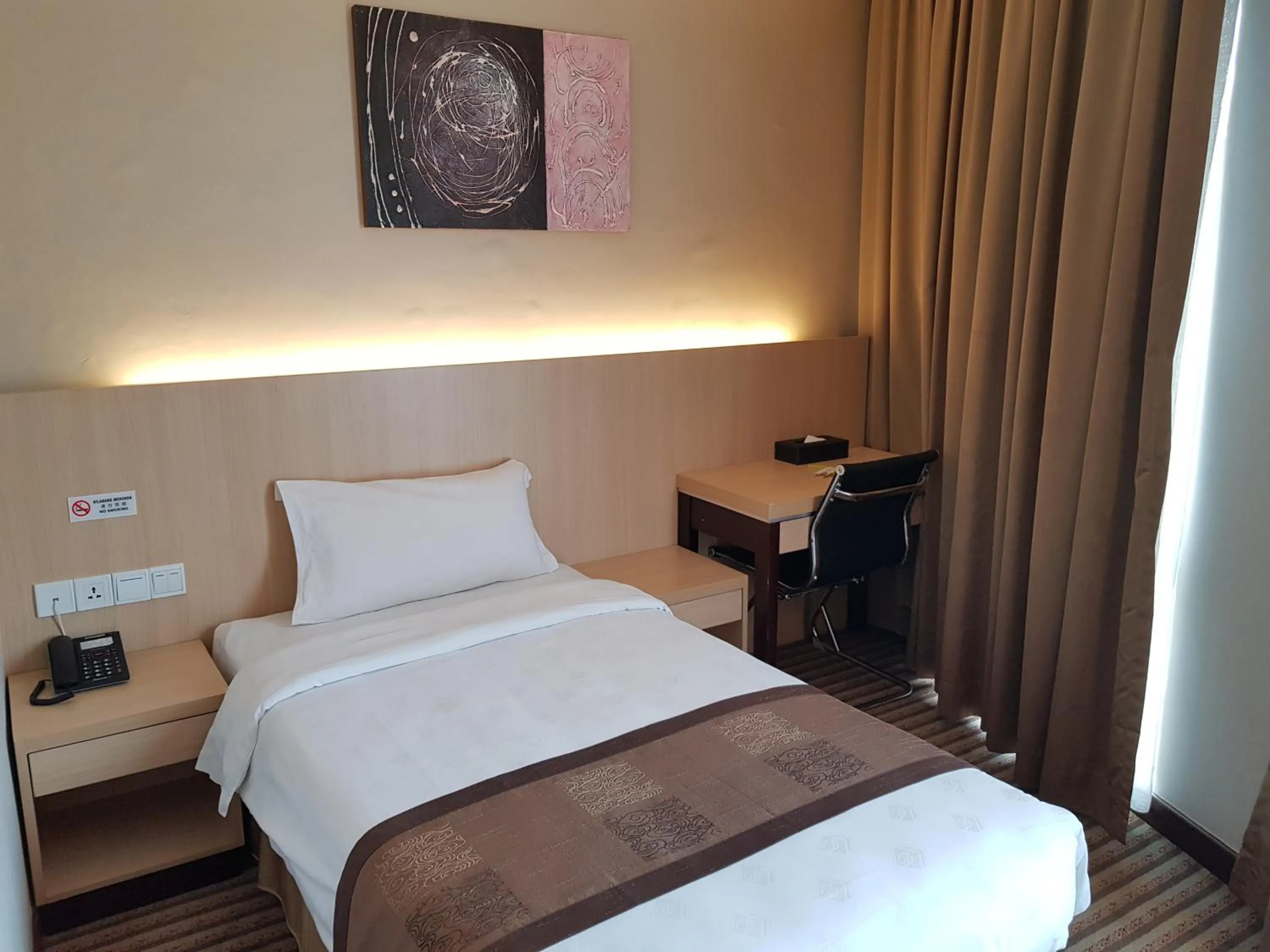 Bed in DeHome Boutique Hotel