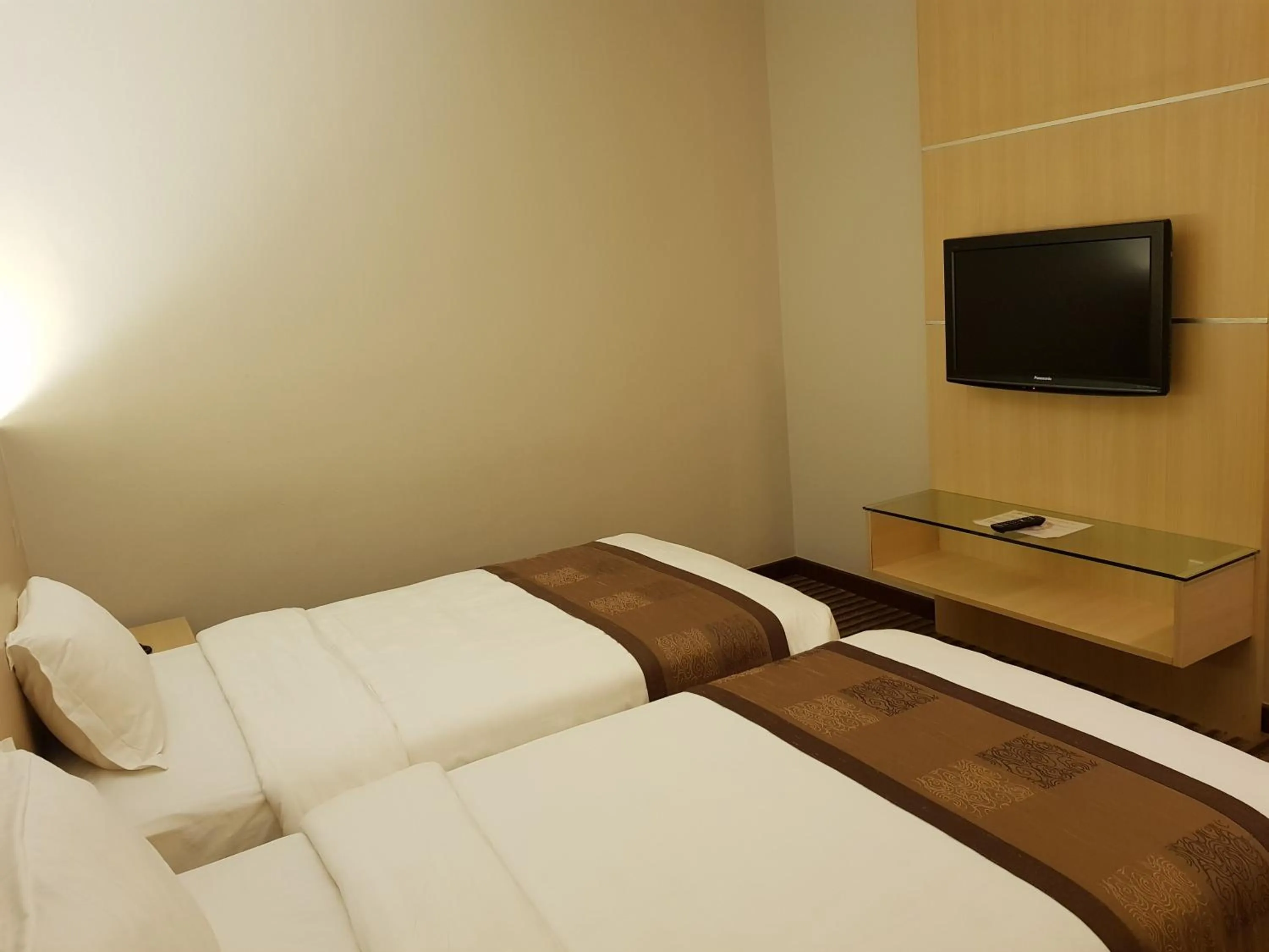 Bed in DeHome Boutique Hotel