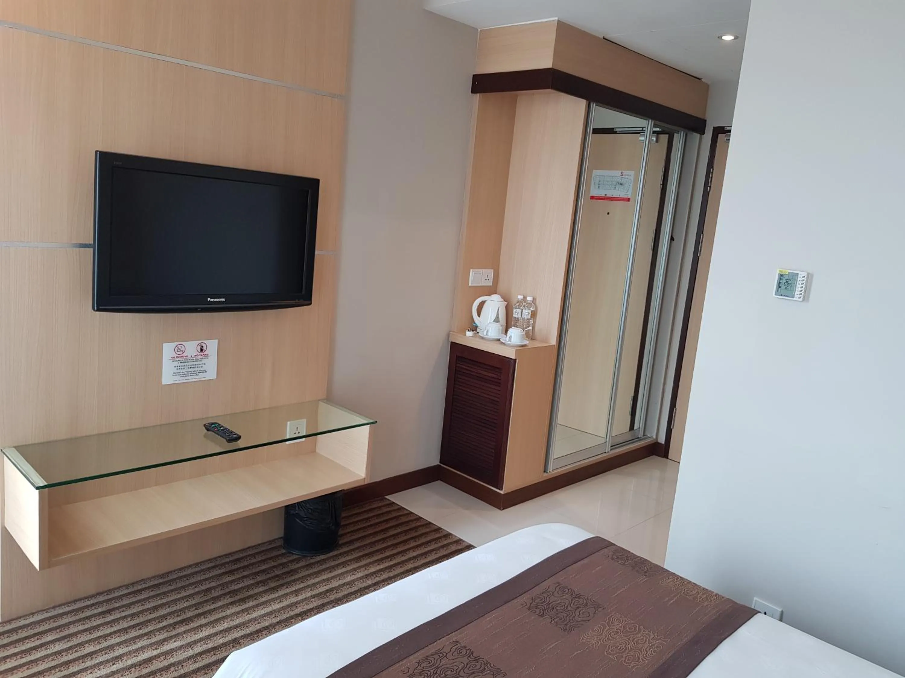 Bedroom in DeHome Boutique Hotel