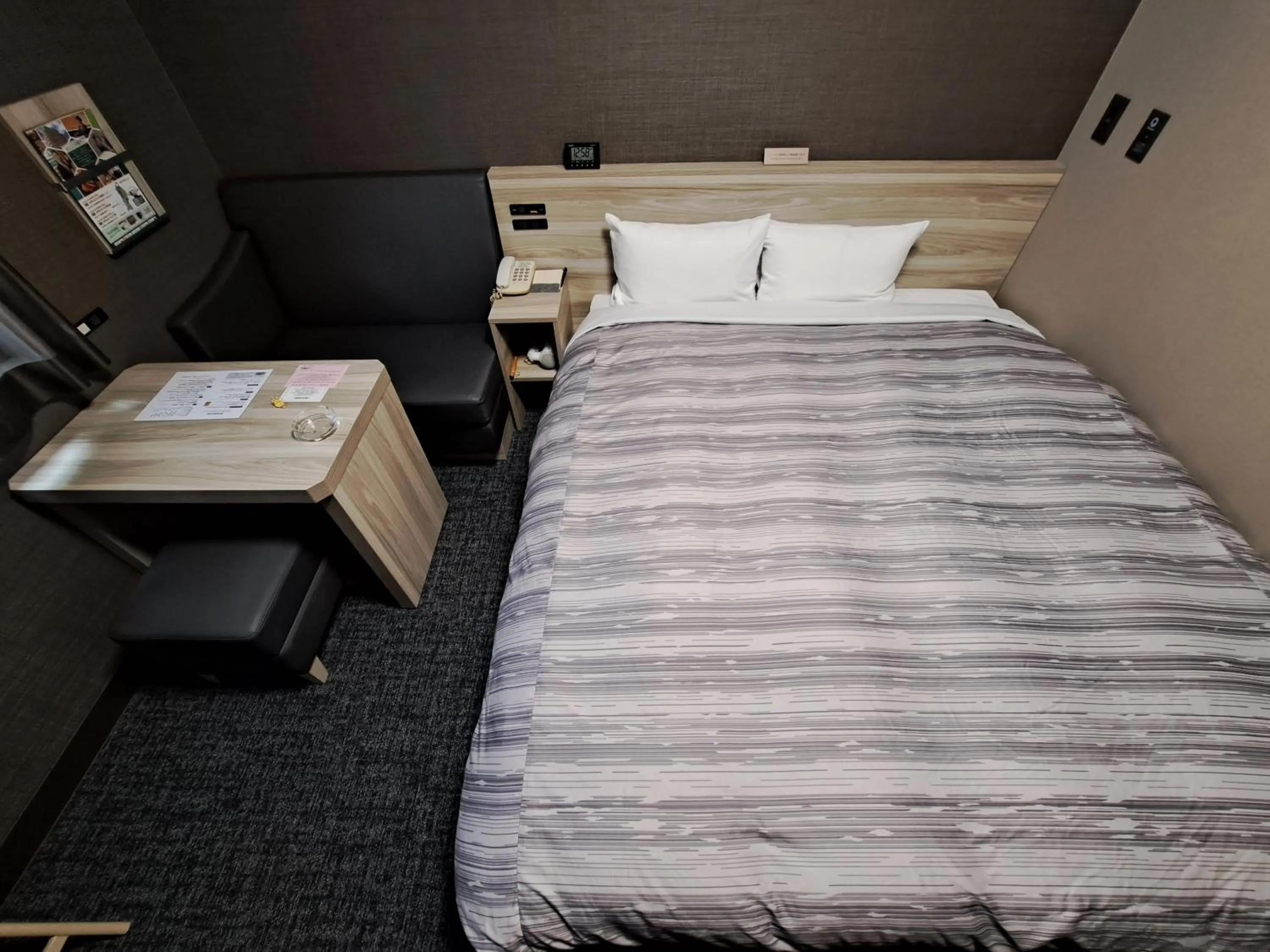 Bed in Route Inn Grantia Akita Spa Resort