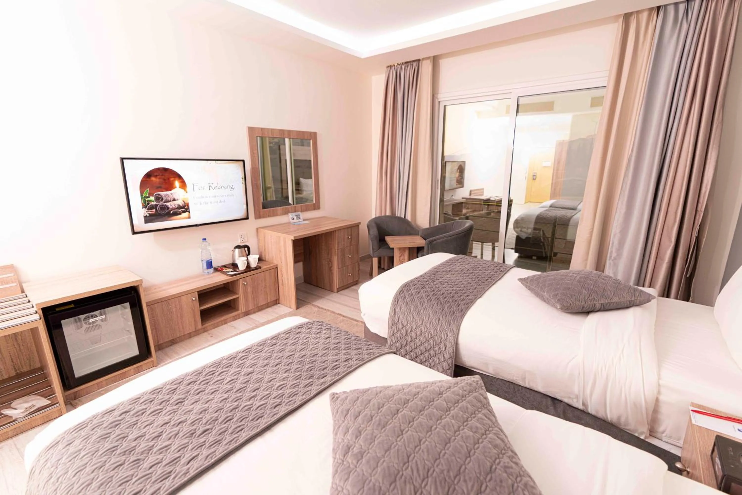 Bed in Petra Moon Hotel