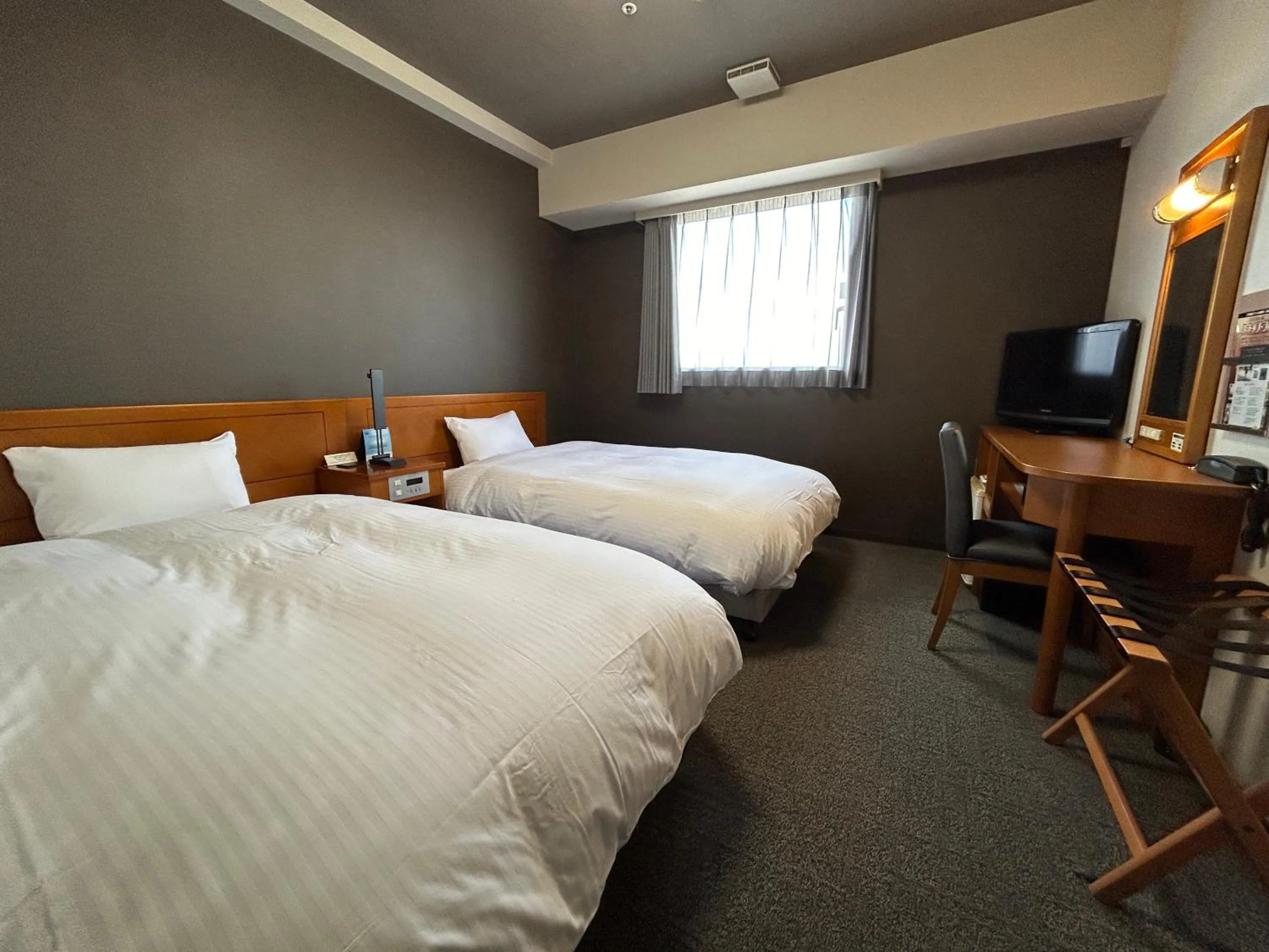 Photo of the whole room, Bed in Hotel Route-Inn Kanazawa Ekimae