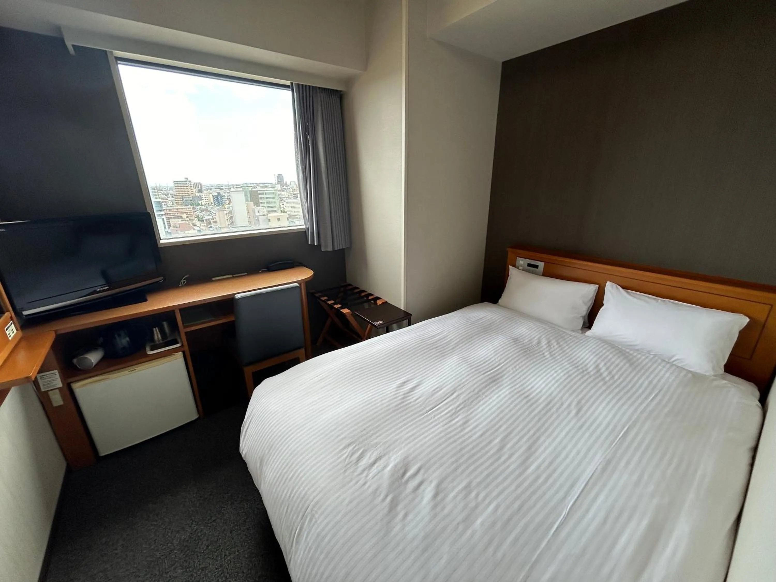 Photo of the whole room, Bed in Hotel Route-Inn Kanazawa Ekimae