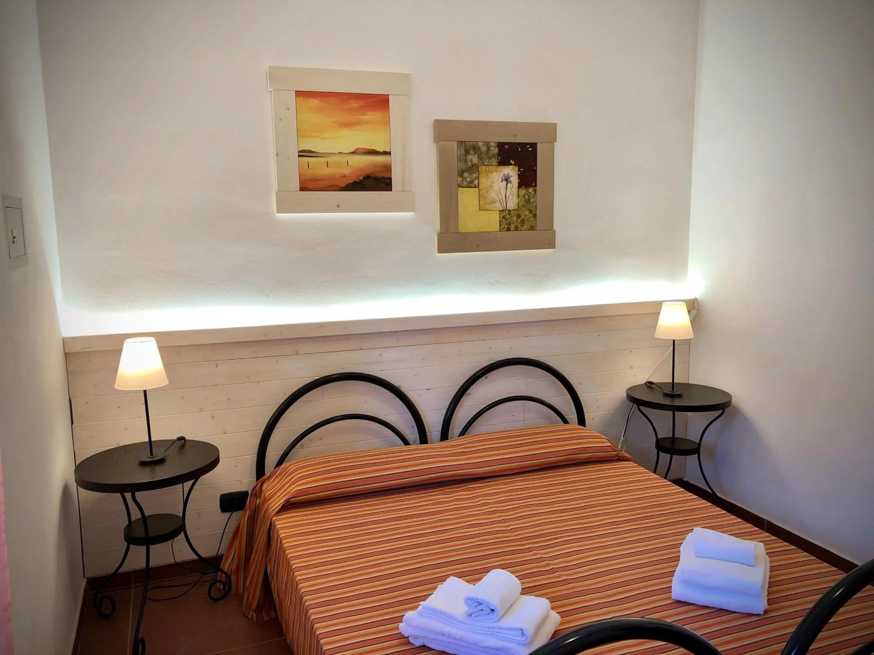 Photo of the whole room, Bed in Residence La Luna Nel Pozzo