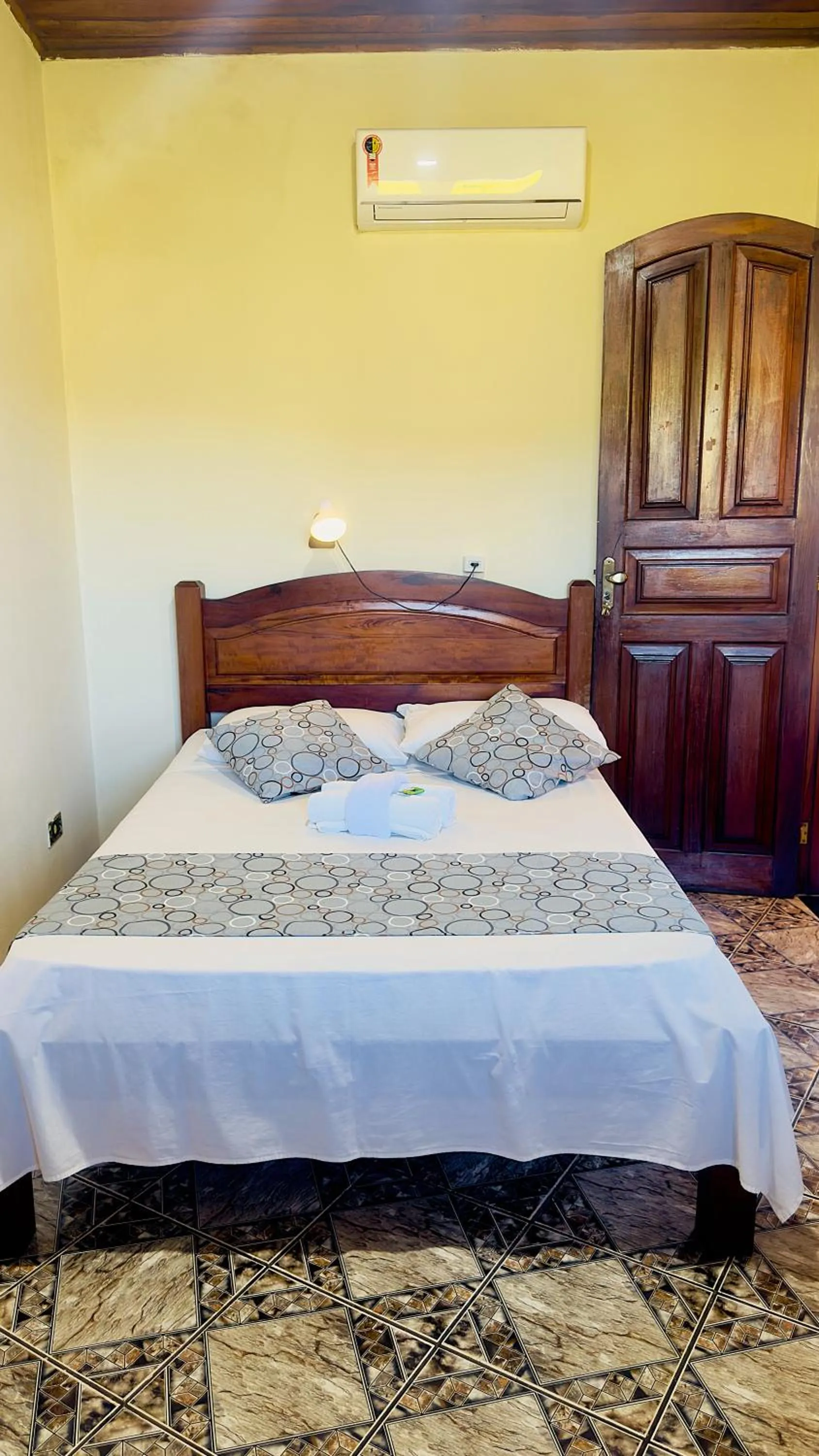 Bed in Pousada Parque Imperial no centro de Paraty