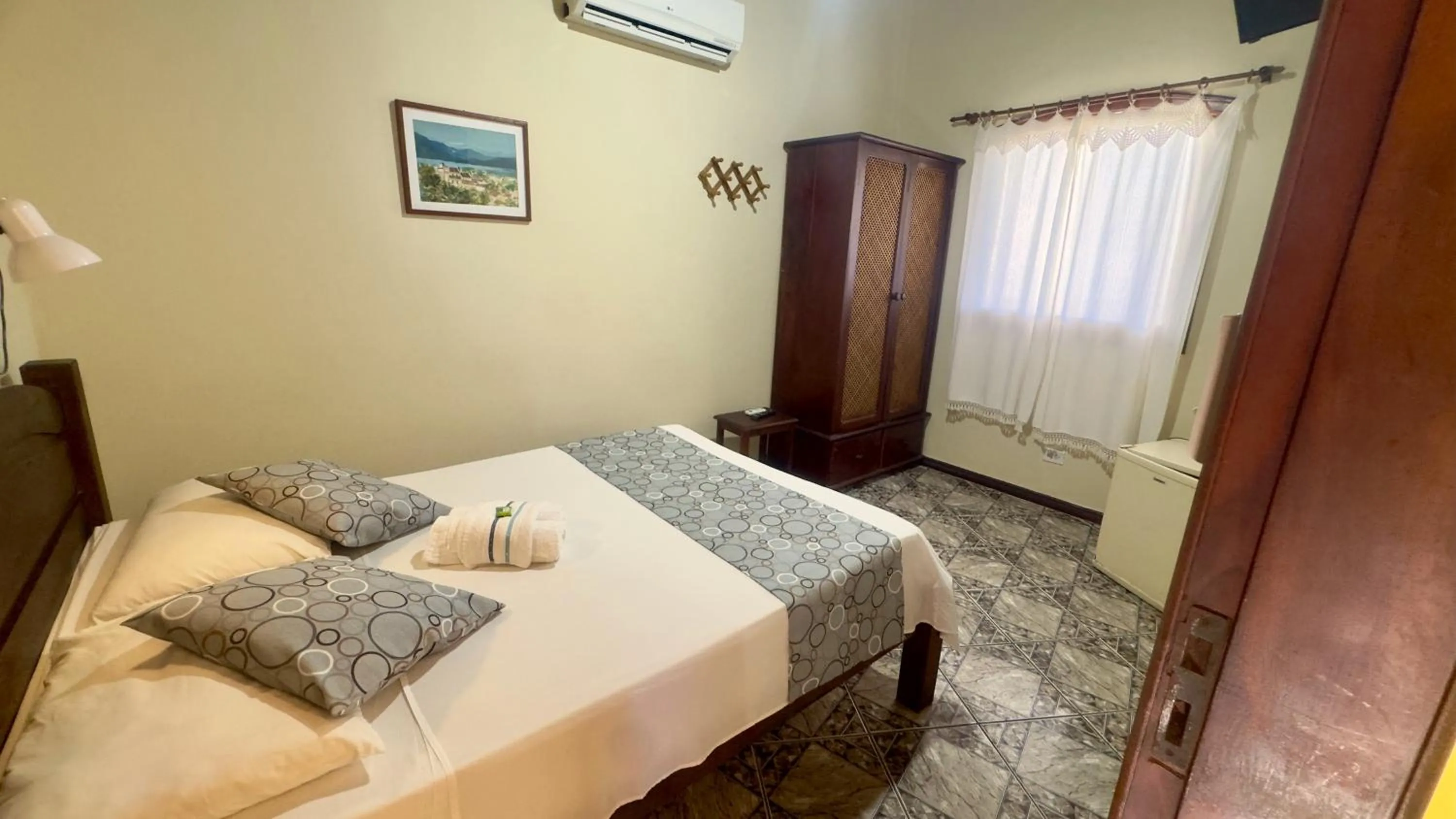 Bed in Pousada Parque Imperial no centro de Paraty