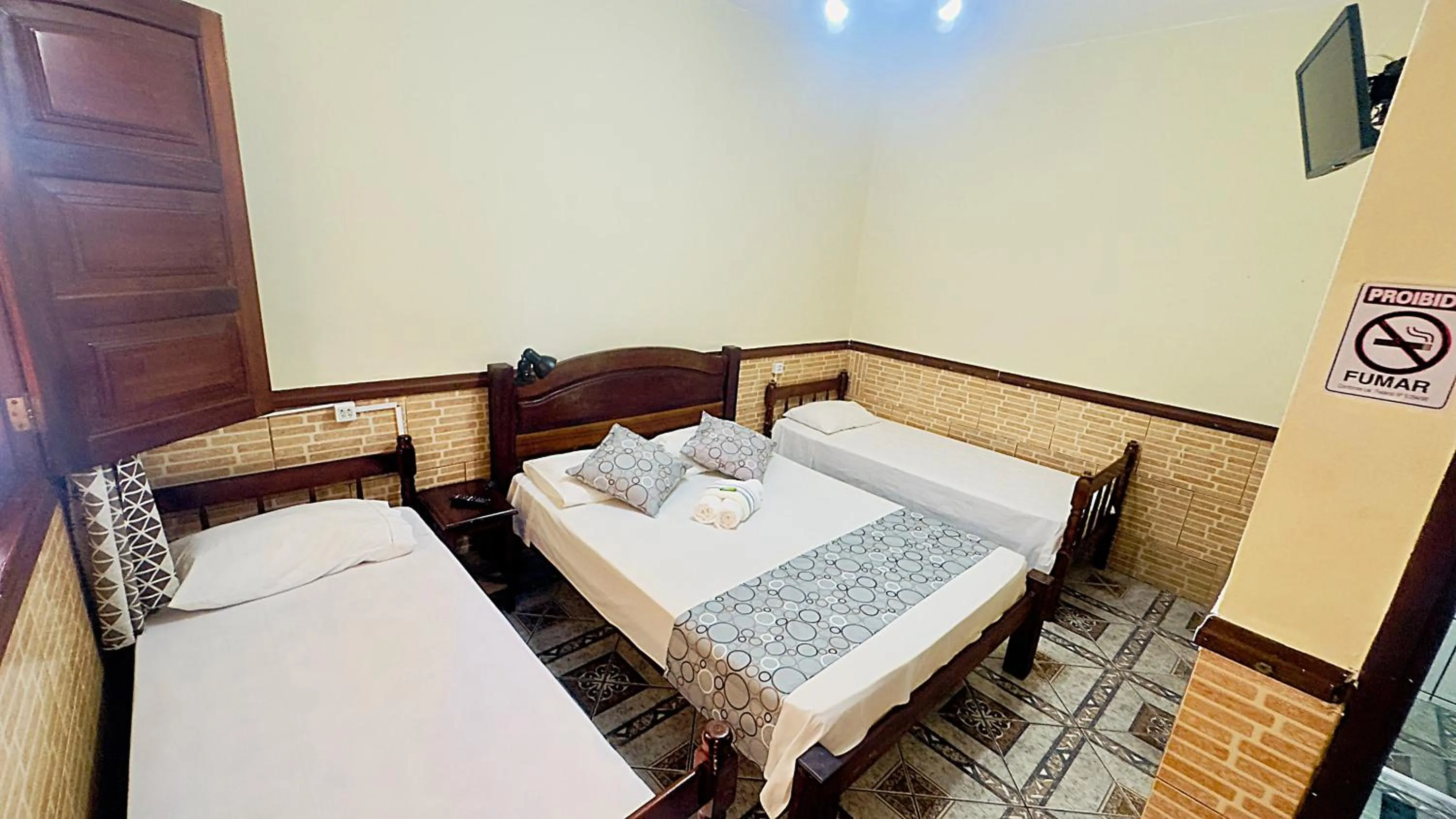 Bed in Pousada Parque Imperial no centro de Paraty