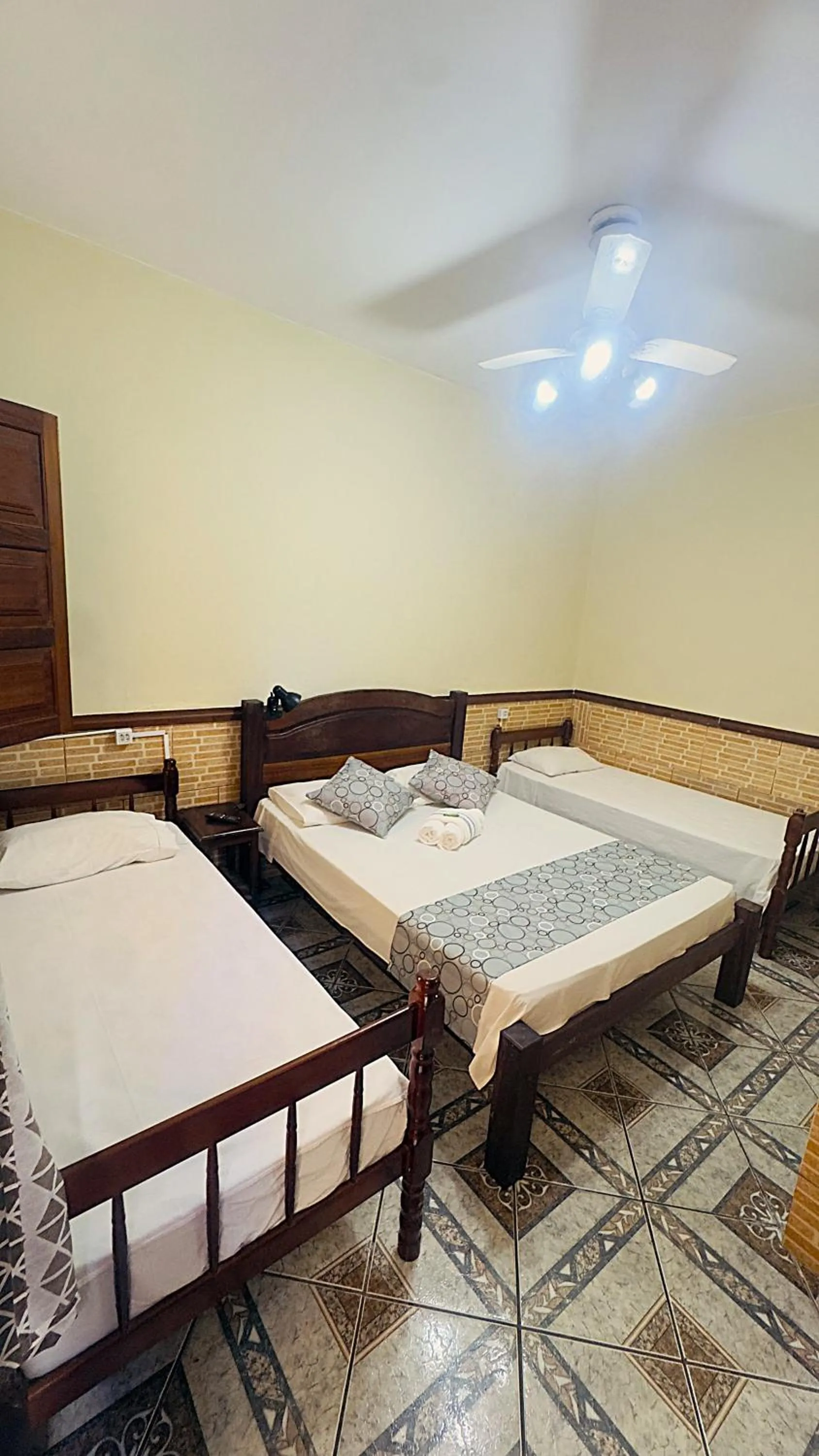 Bed in Pousada Parque Imperial no centro de Paraty