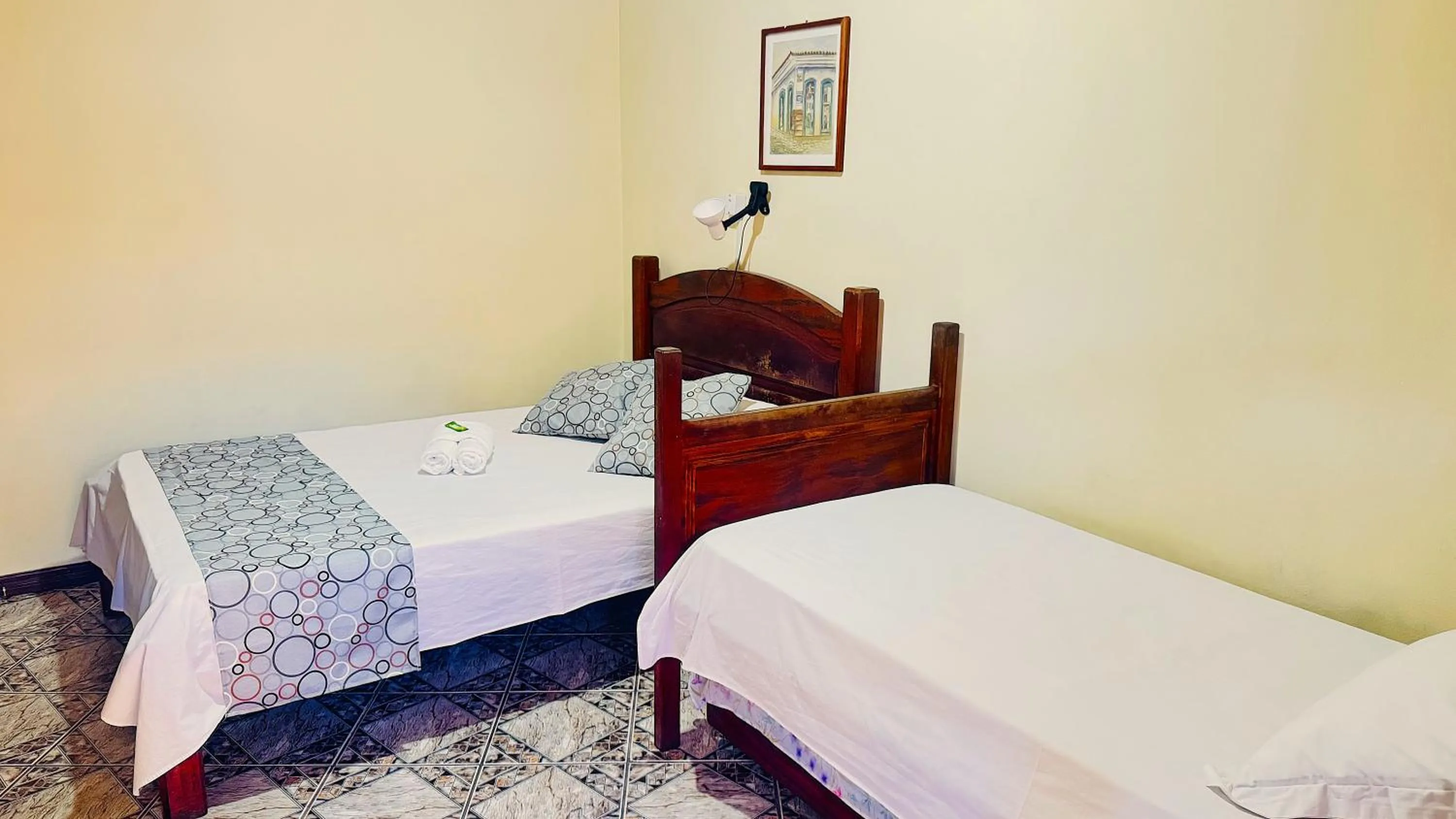 Bed in Pousada Parque Imperial no centro de Paraty