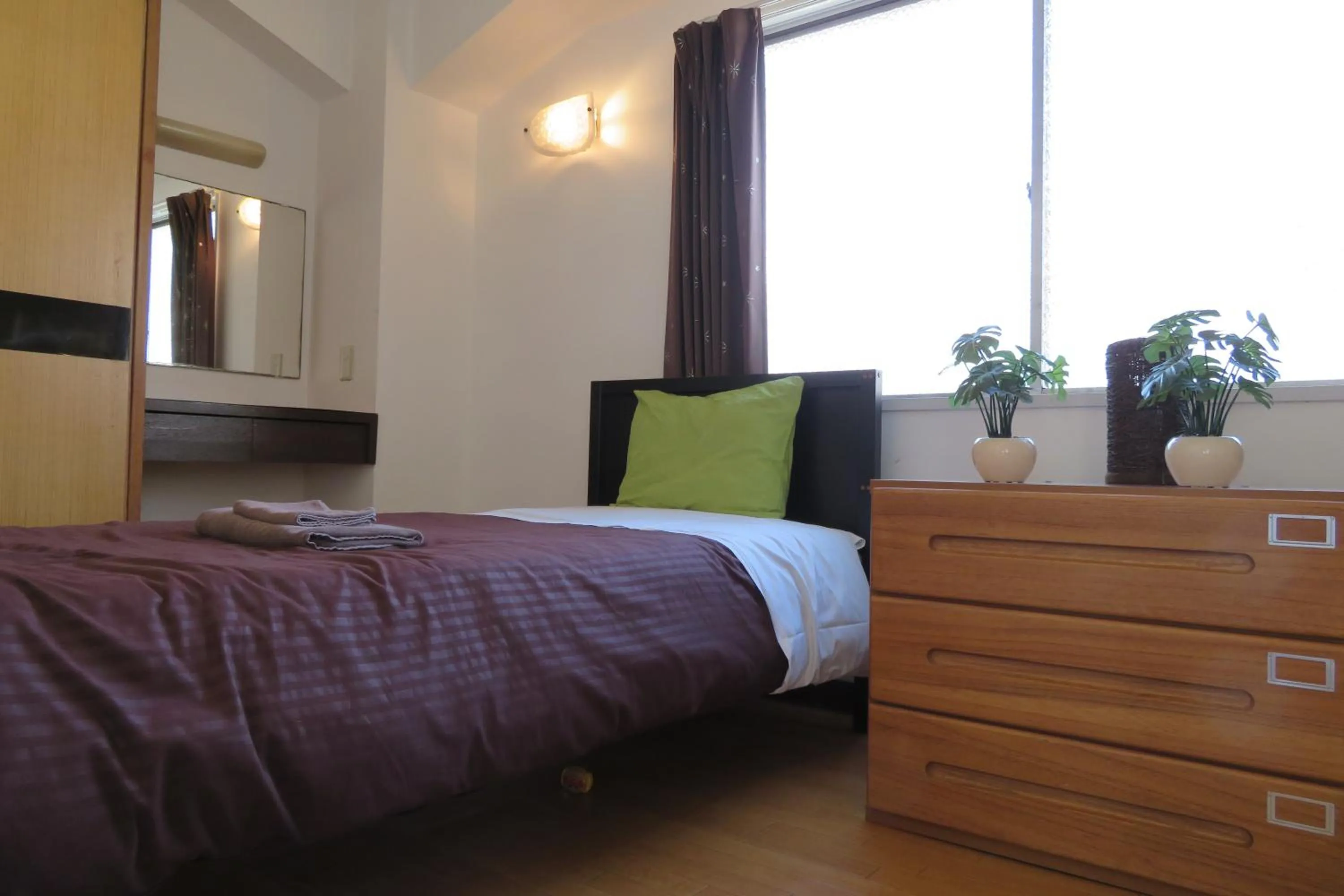 Bedroom, Bed in Sea View Court Kobe