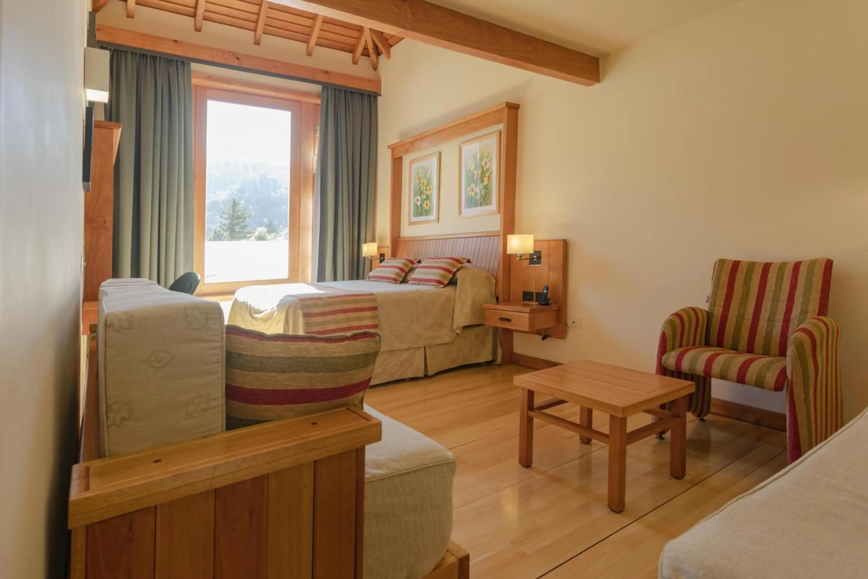 Bedroom in Hotel y Cabañas Le Village