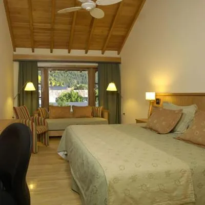 Bedroom, Bed in Hotel y Cabañas Le Village