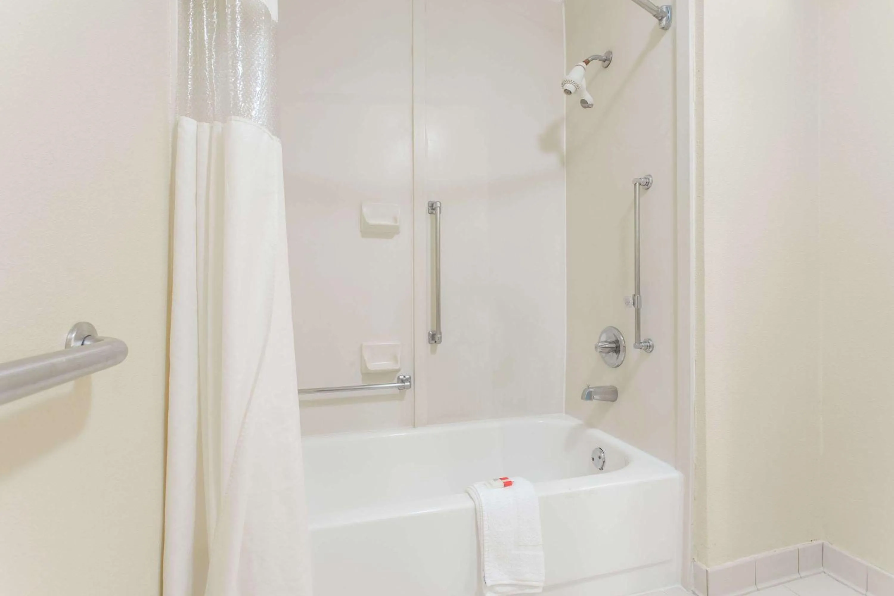 Bathroom in Days Inn by Wyndham Norfolk Airport