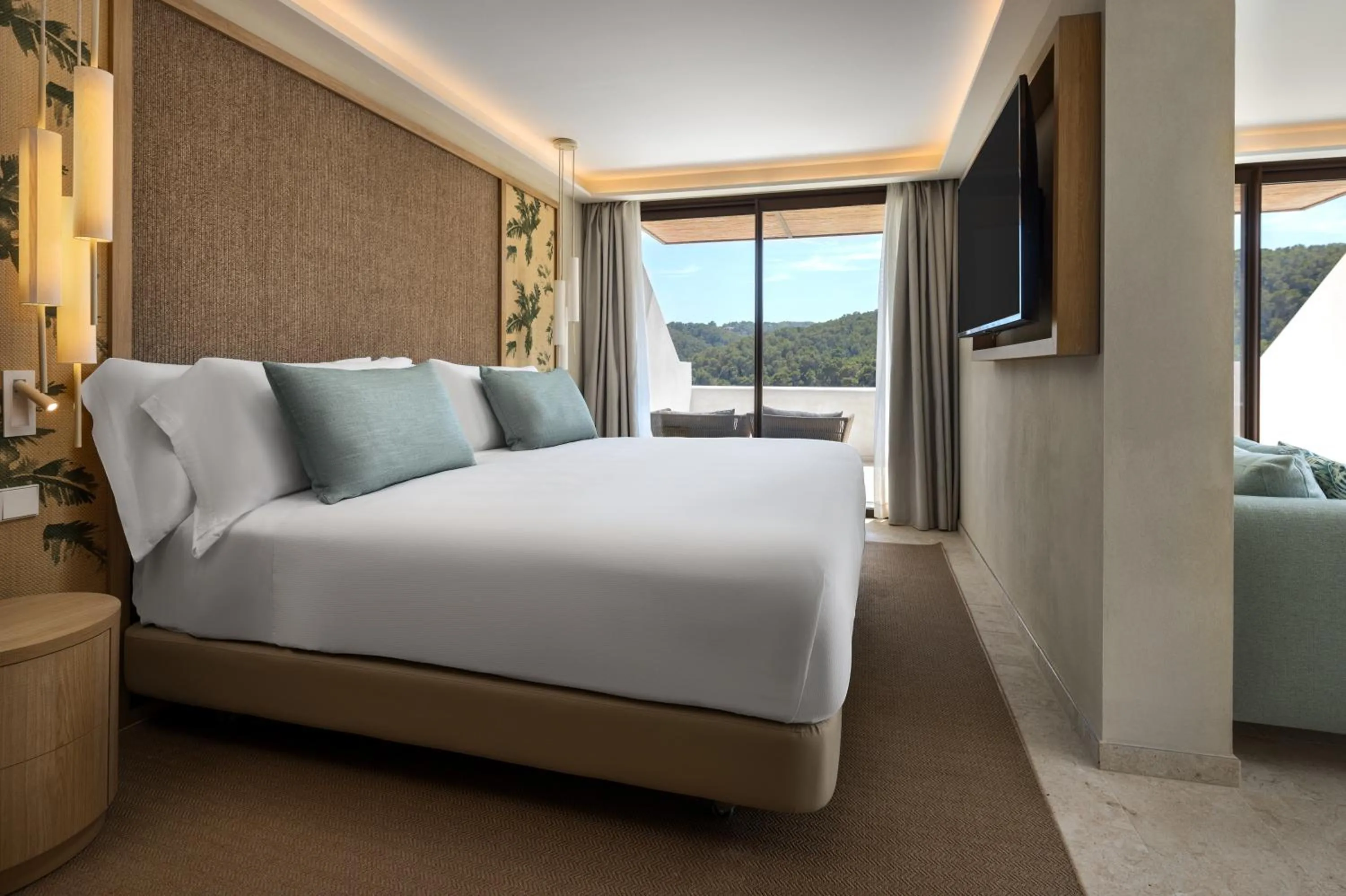 Bed in Cala San Miguel Ibiza Resort, Adults only, Curio Collection by Hilton
