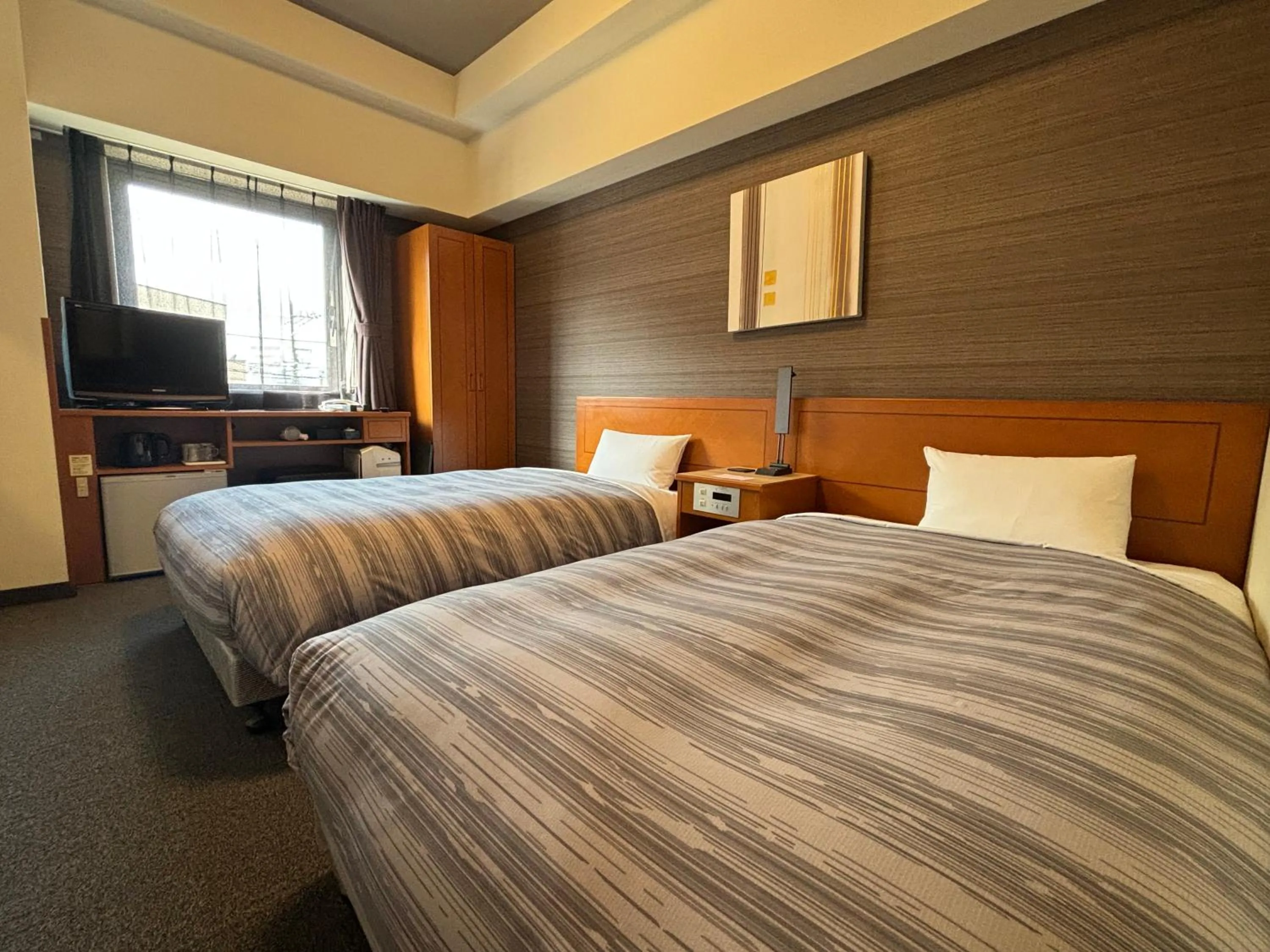 Photo of the whole room, Bed in Hotel Route-Inn Asahikawa Ekimae Ichijodori