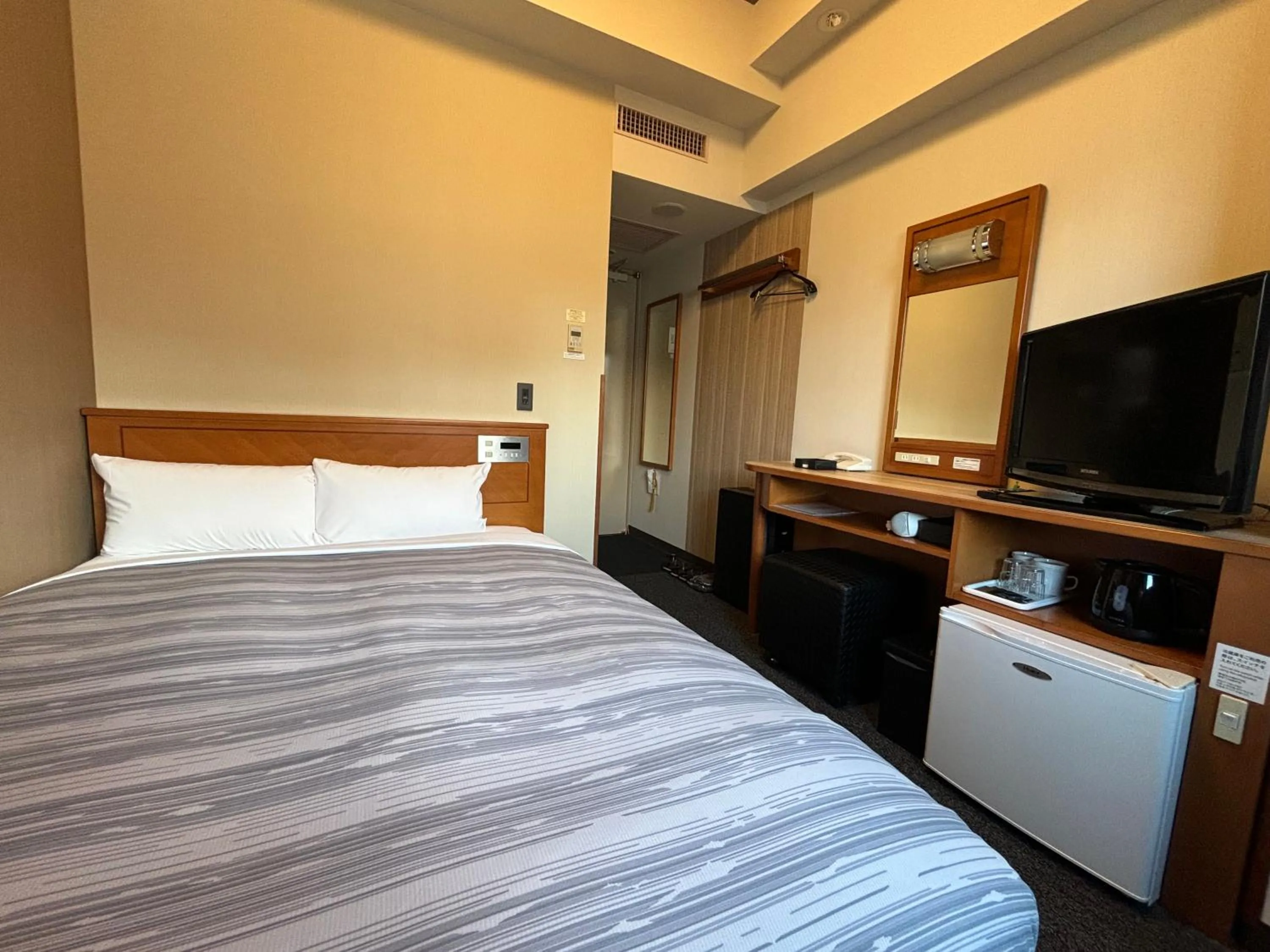 Photo of the whole room, Bed in Hotel Route-Inn Asahikawa Ekimae Ichijodori