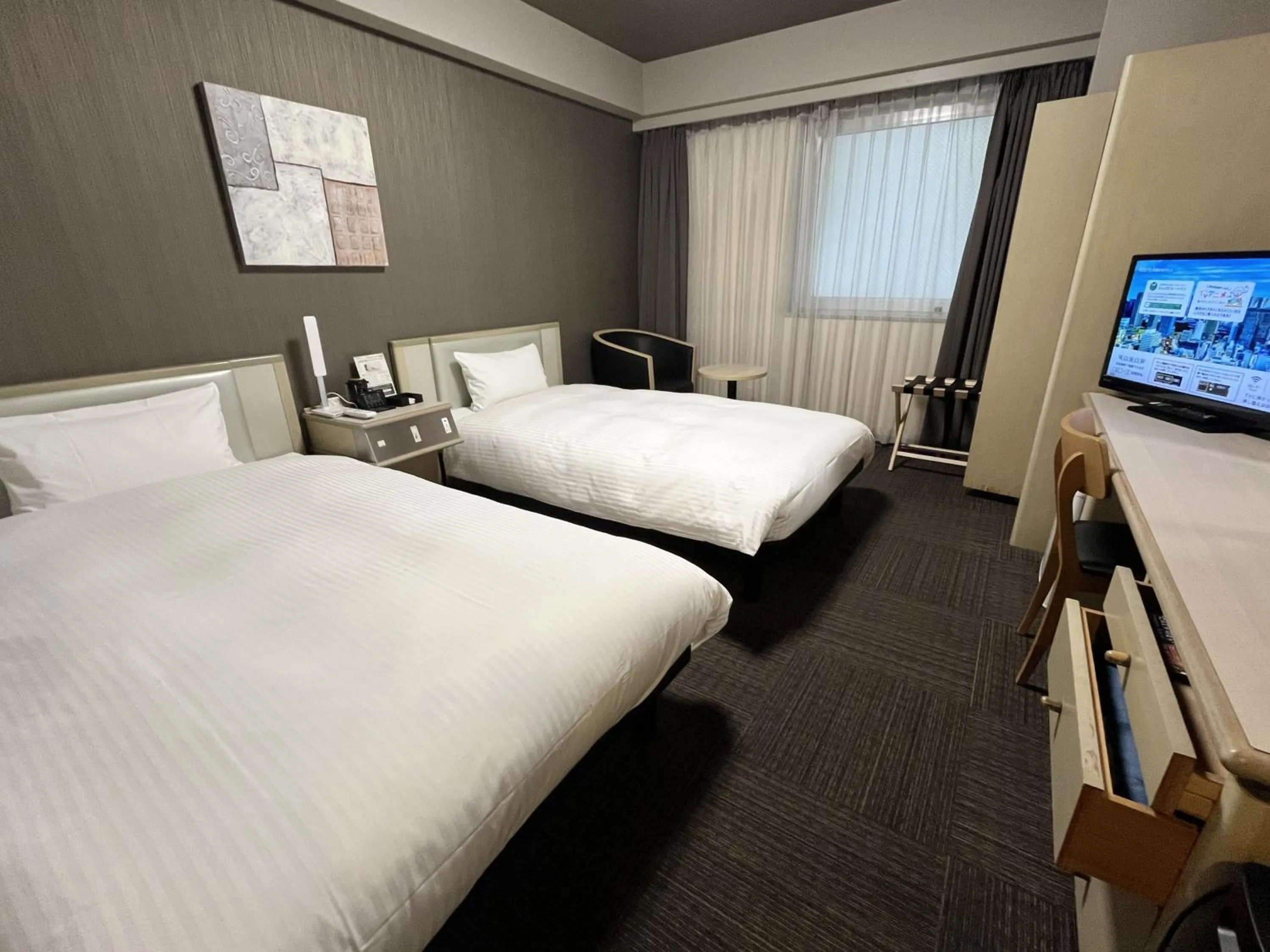 Photo of the whole room, Bed in Hotel Route-Inn Tokyo Ikebukuro