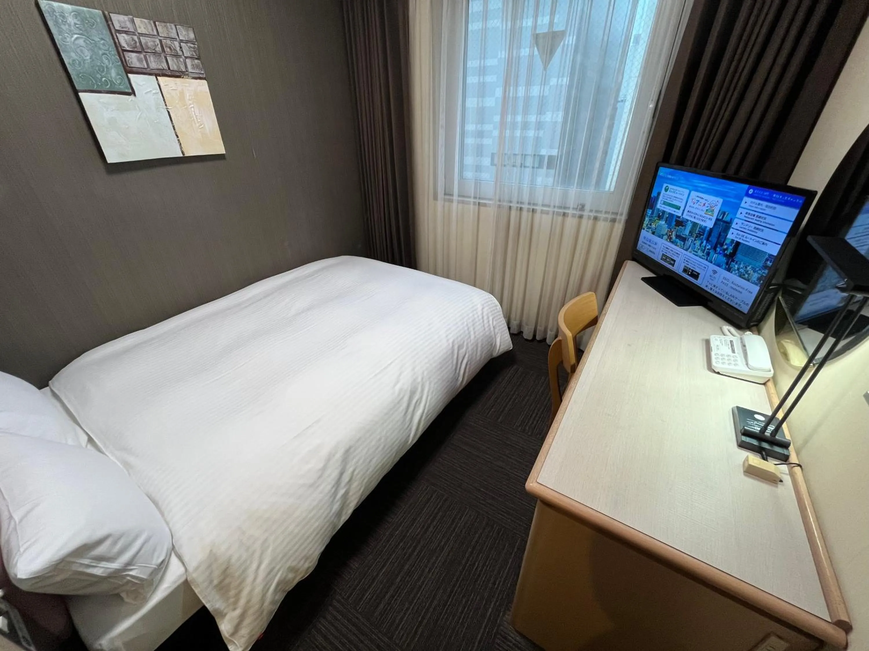 Photo of the whole room, Bed in Hotel Route-Inn Tokyo Ikebukuro