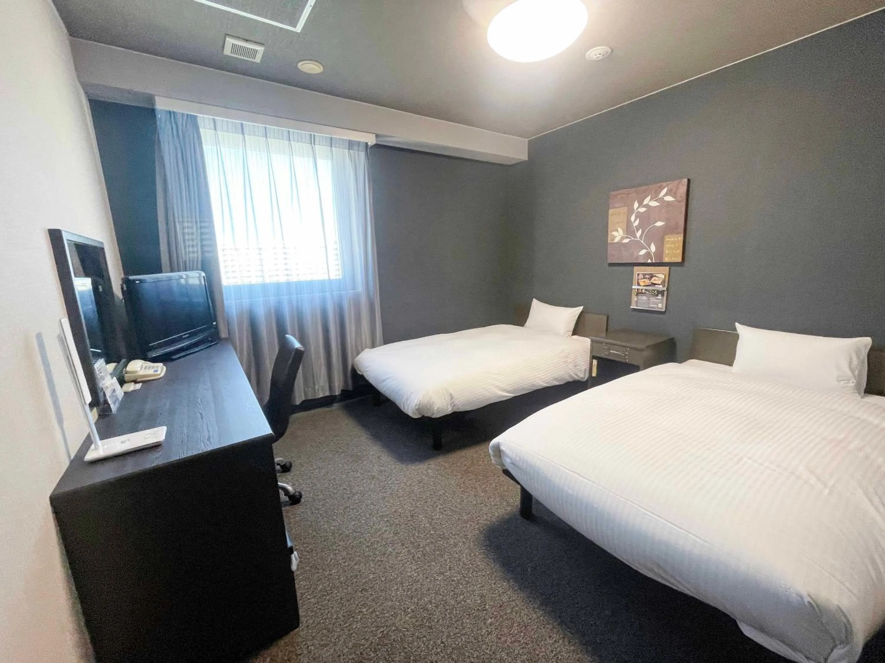 Photo of the whole room, Bed in Route Inn Grantia Naha