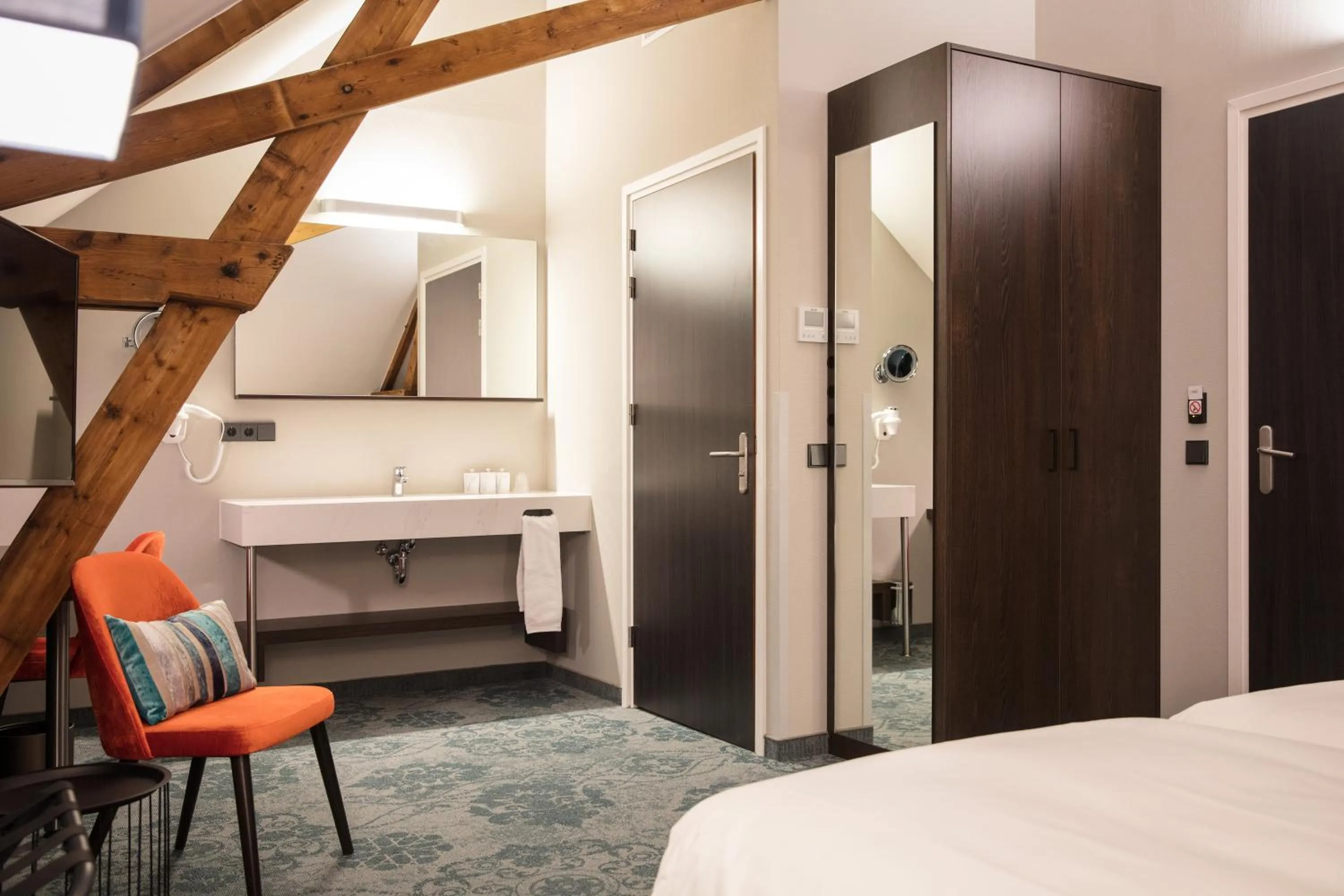 Seating area, Bed in Hotel de Koppelpaarden