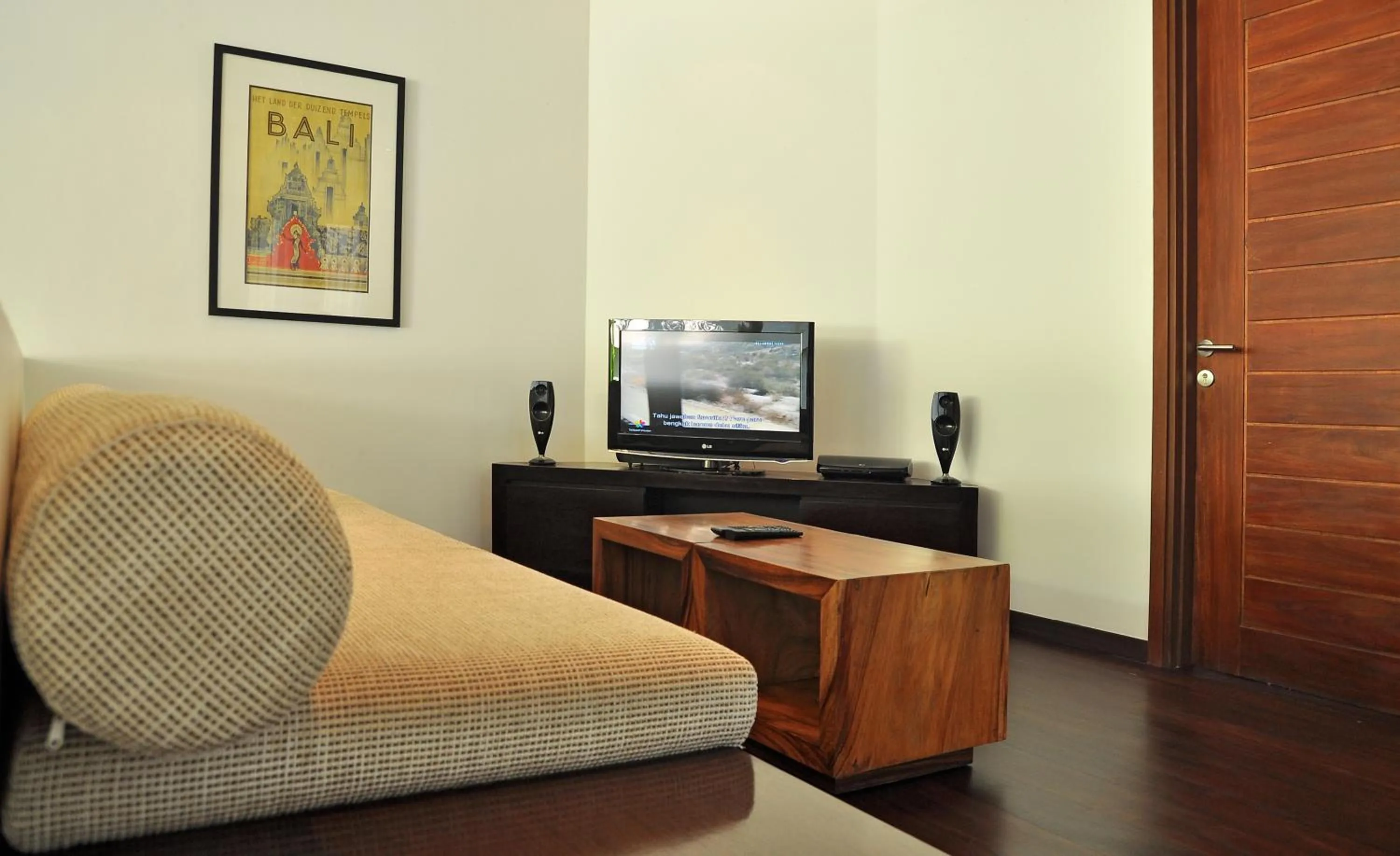 Communal lounge/ TV room in Villa La Sirena by Nagisa Bali