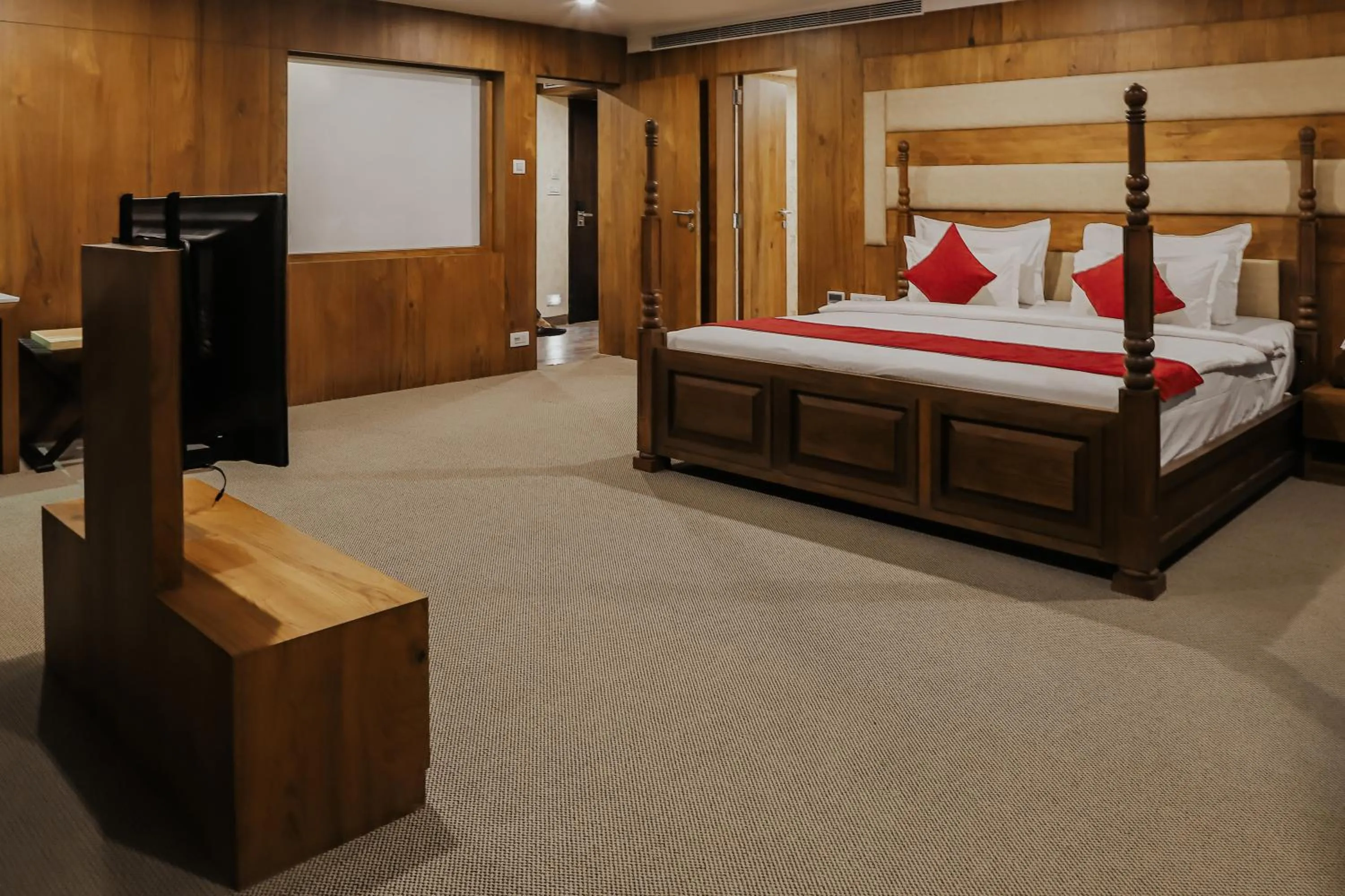 Bedroom, Bed in Regenta Central Somnath, Bhalpara