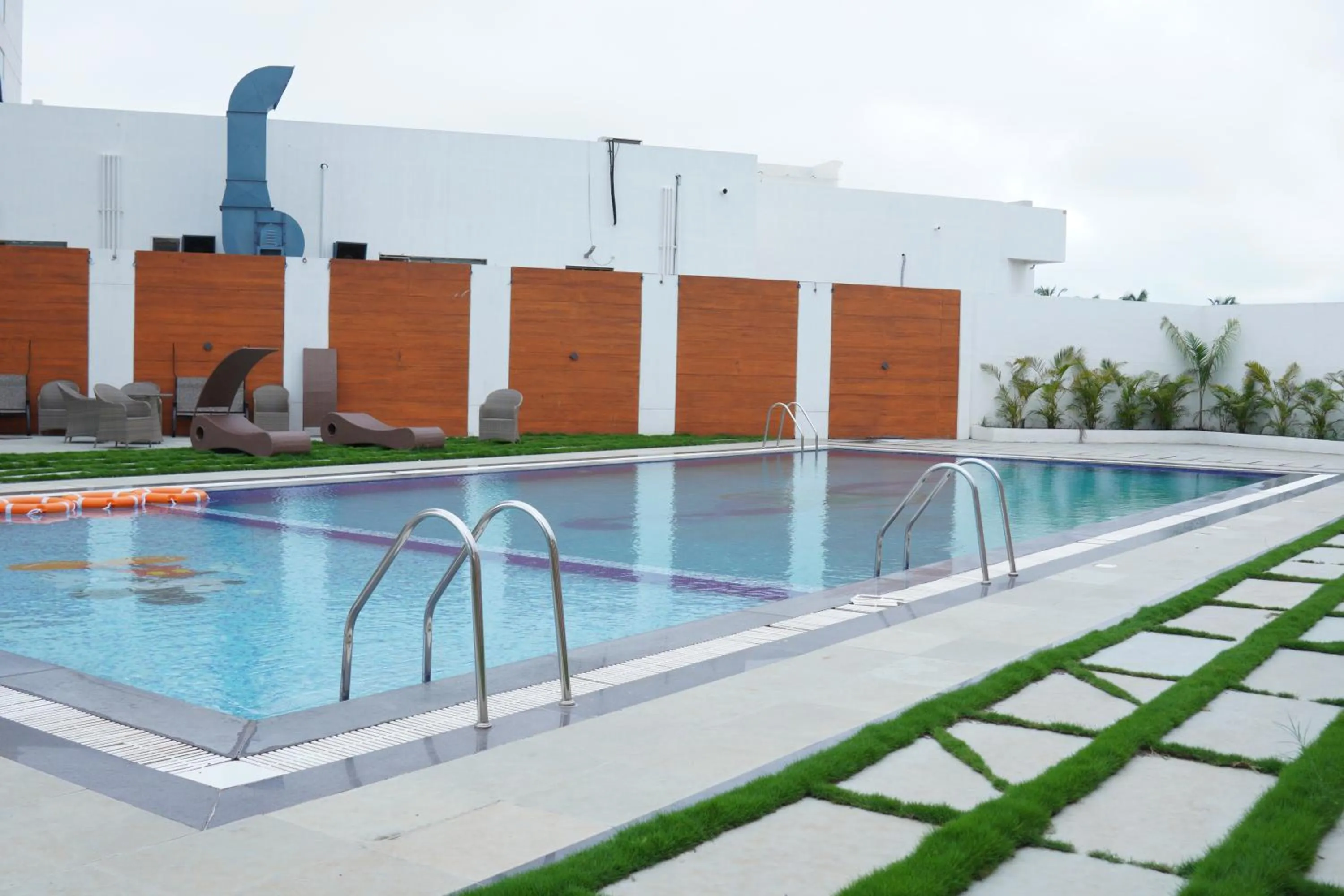 Swimming pool in Regenta Central Somnath, Bhalpara