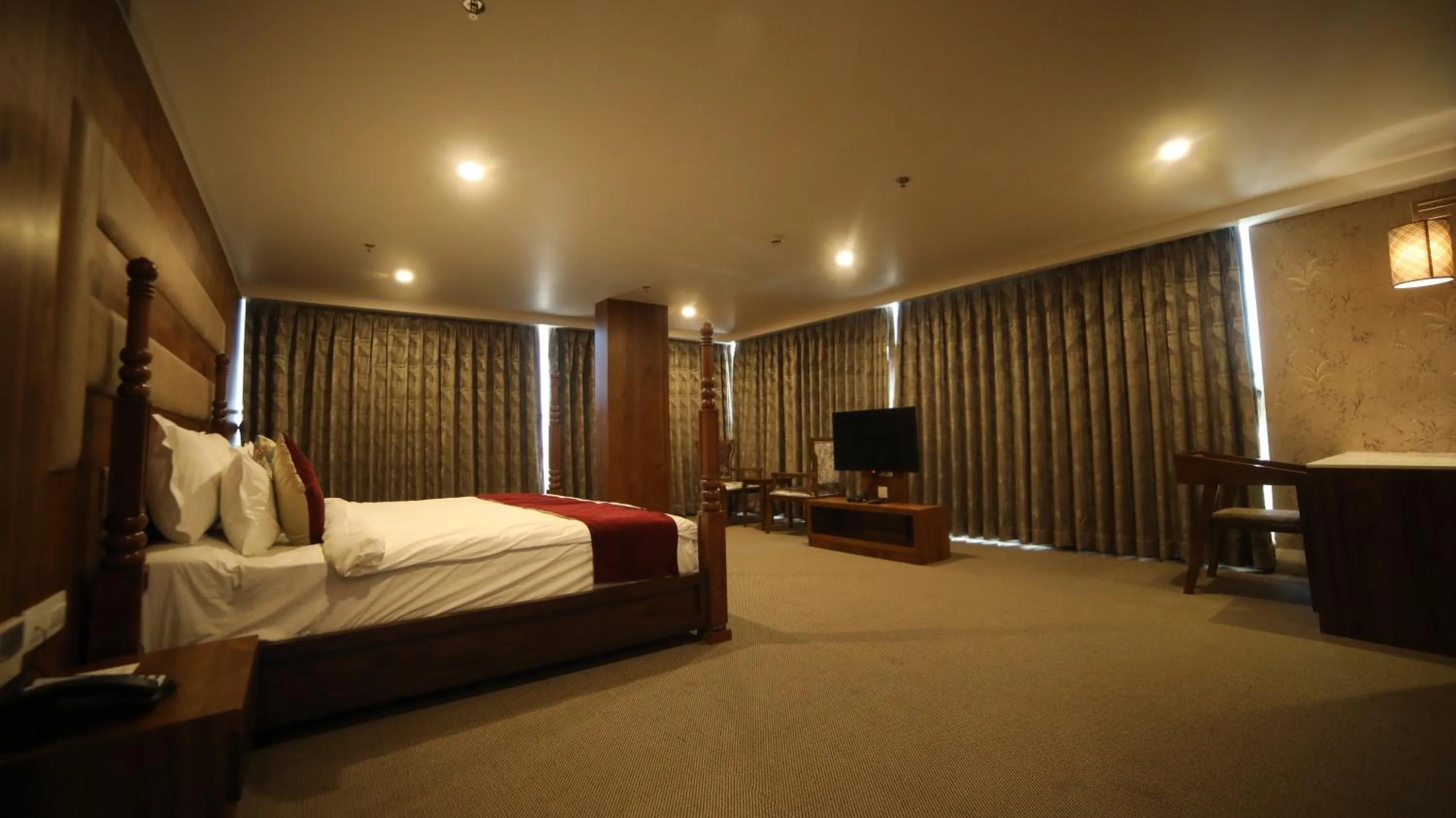 Bedroom, Bed in Regenta Central Somnath, Bhalpara