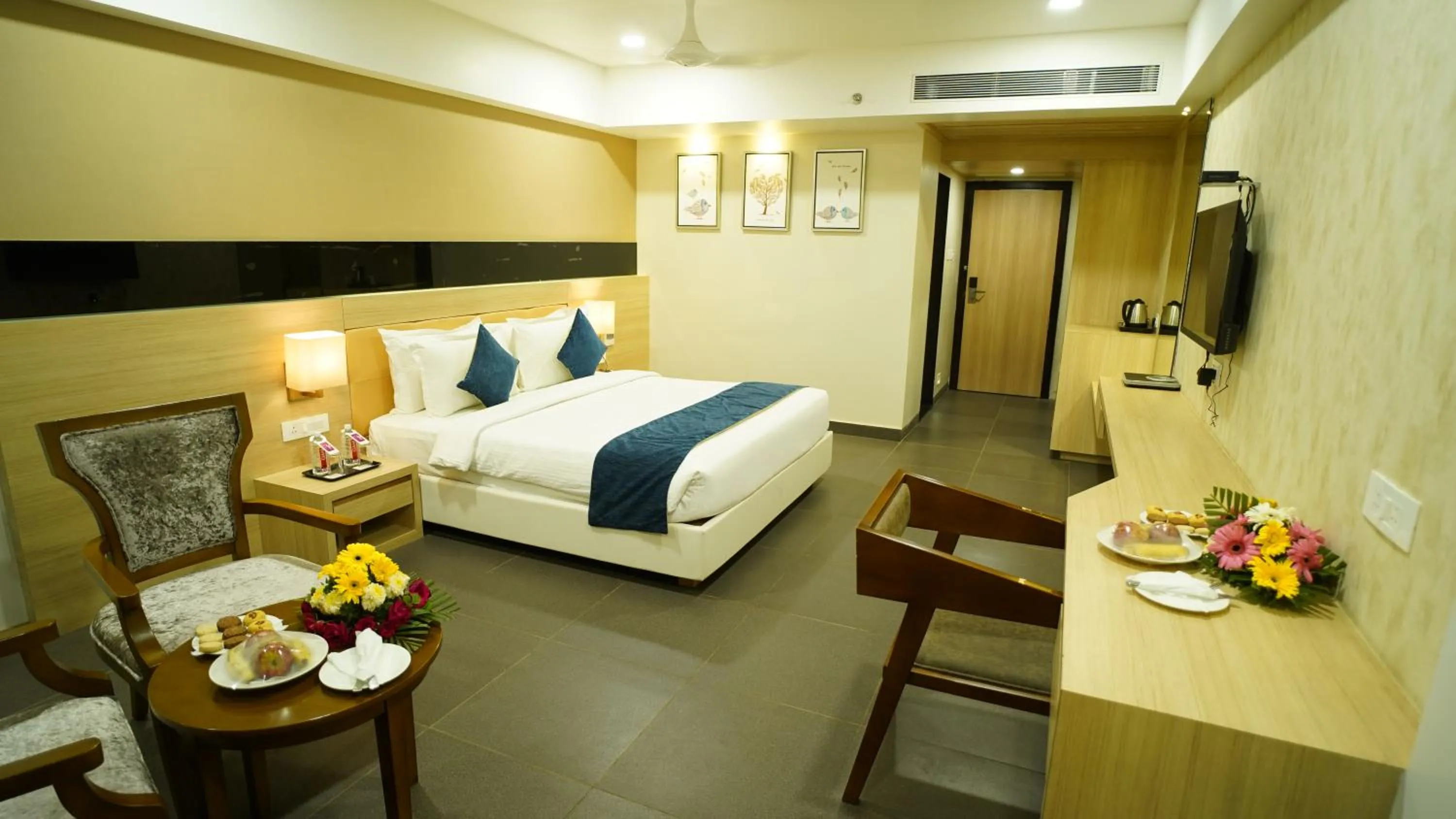 Photo of the whole room, Bed in Regenta Central Somnath, Bhalpara