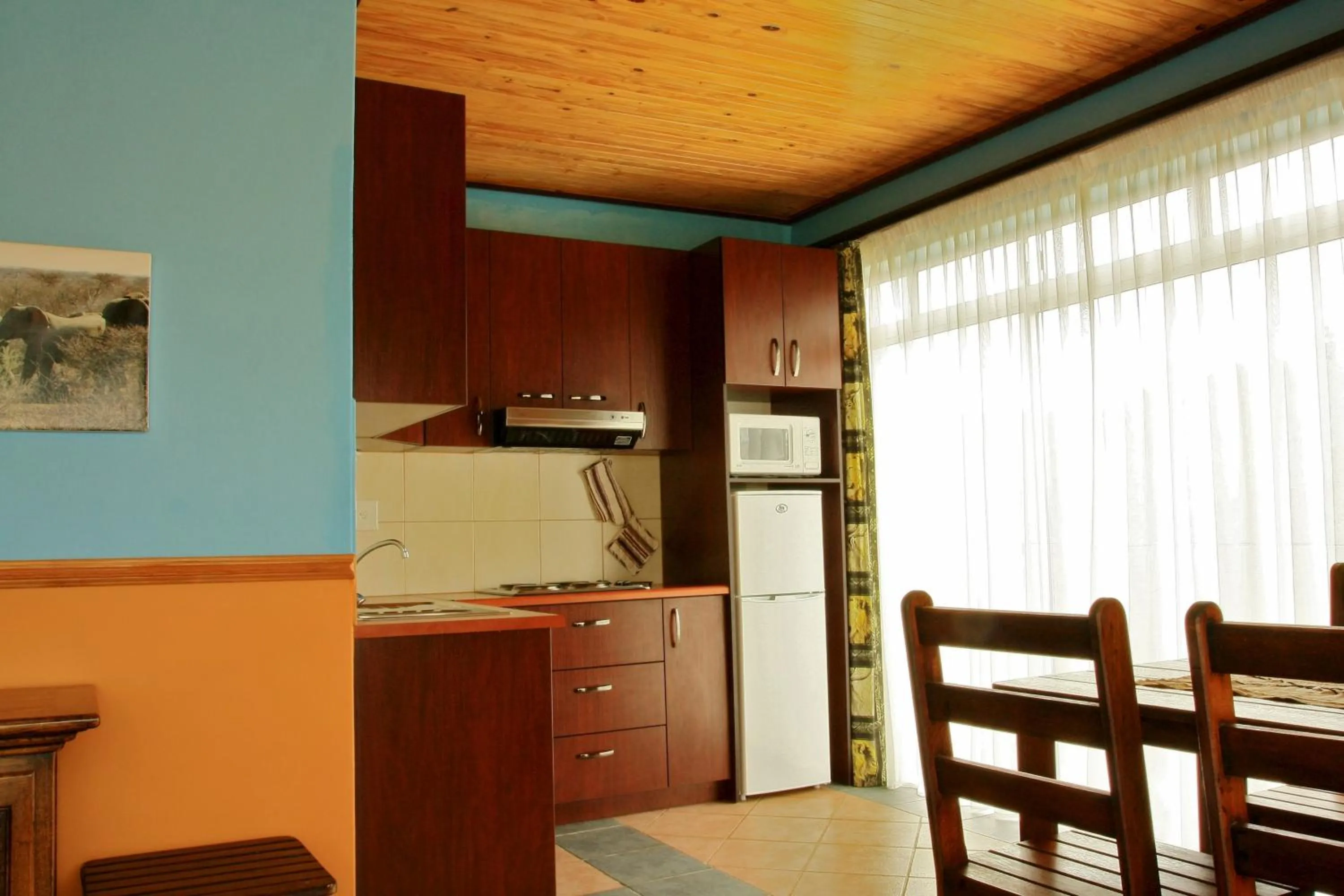 Kitchen or kitchenette in Sandcastle Apartments