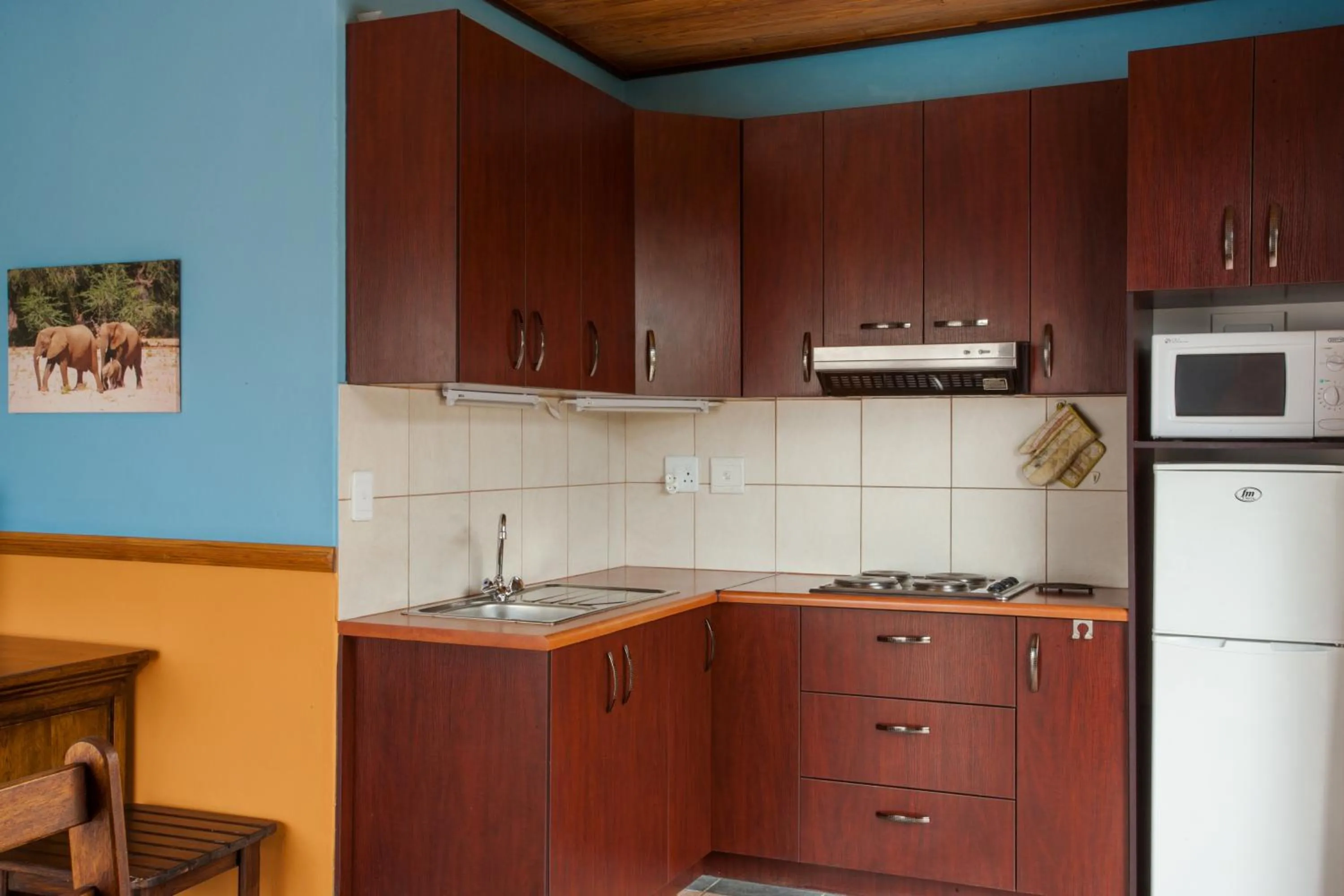 Kitchen or kitchenette in Sandcastle Apartments
