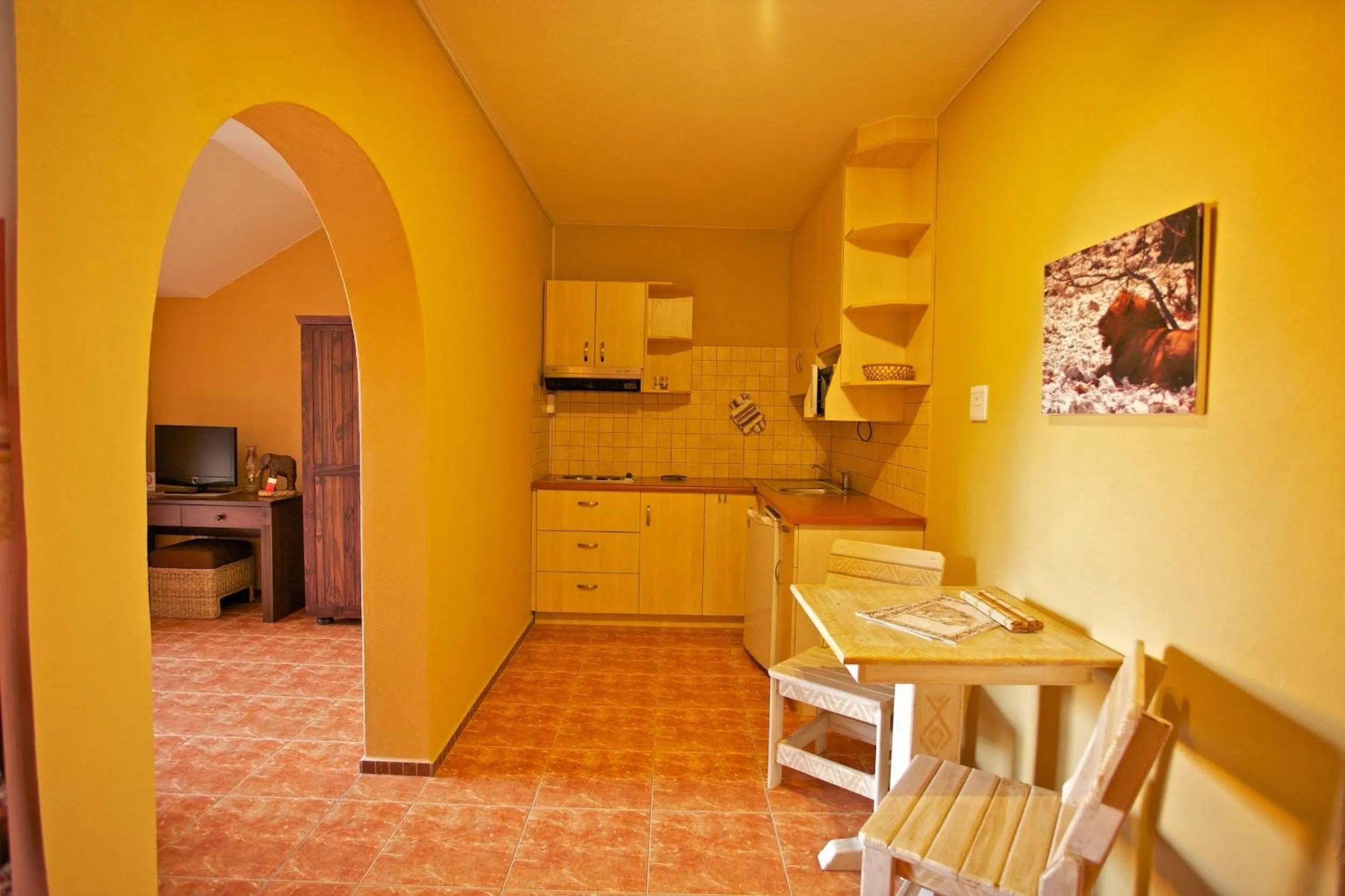 Kitchen or kitchenette in Sandcastle Apartments