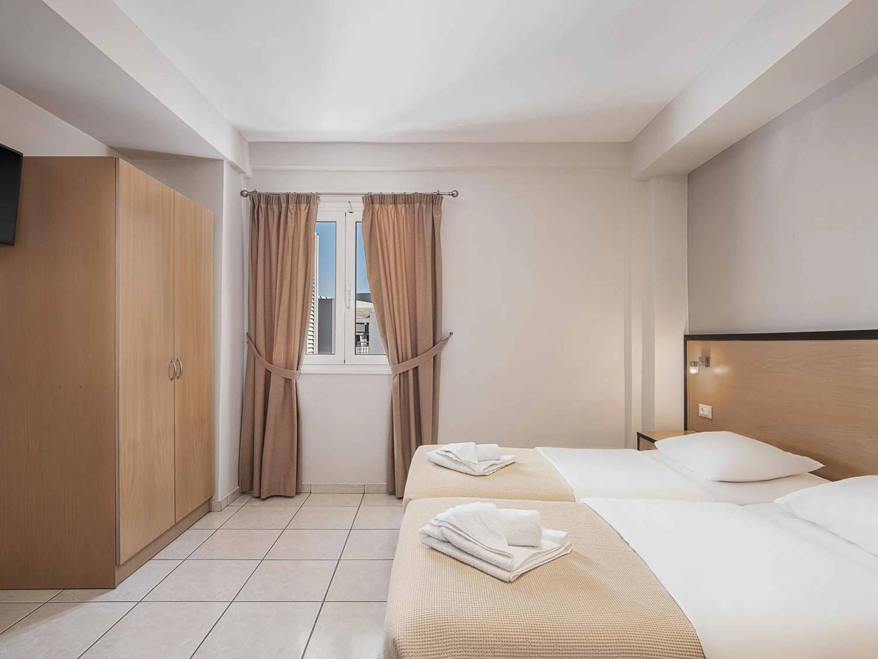 Bed in Theofilos City Hotel