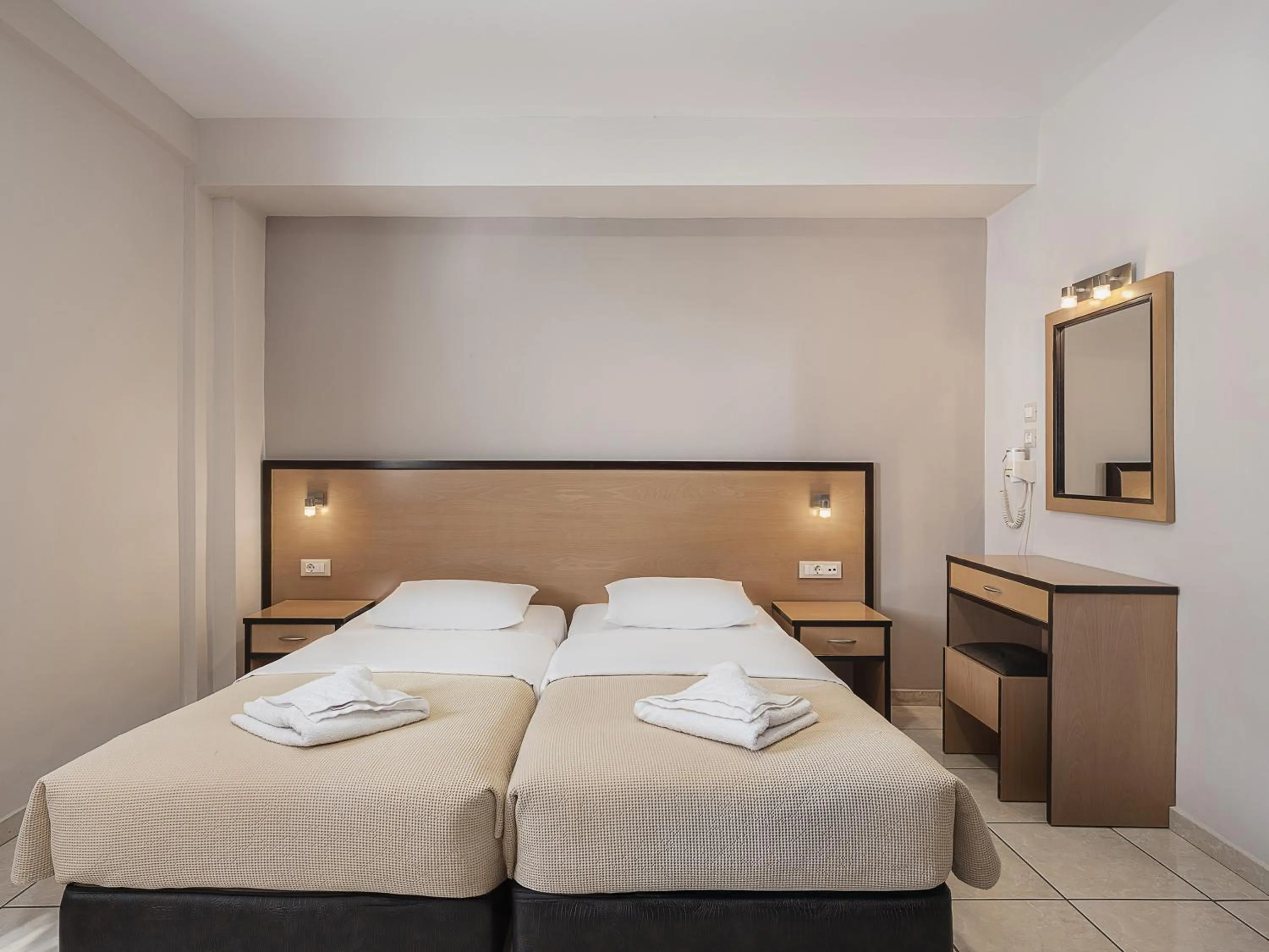 Bed in Theofilos City Hotel