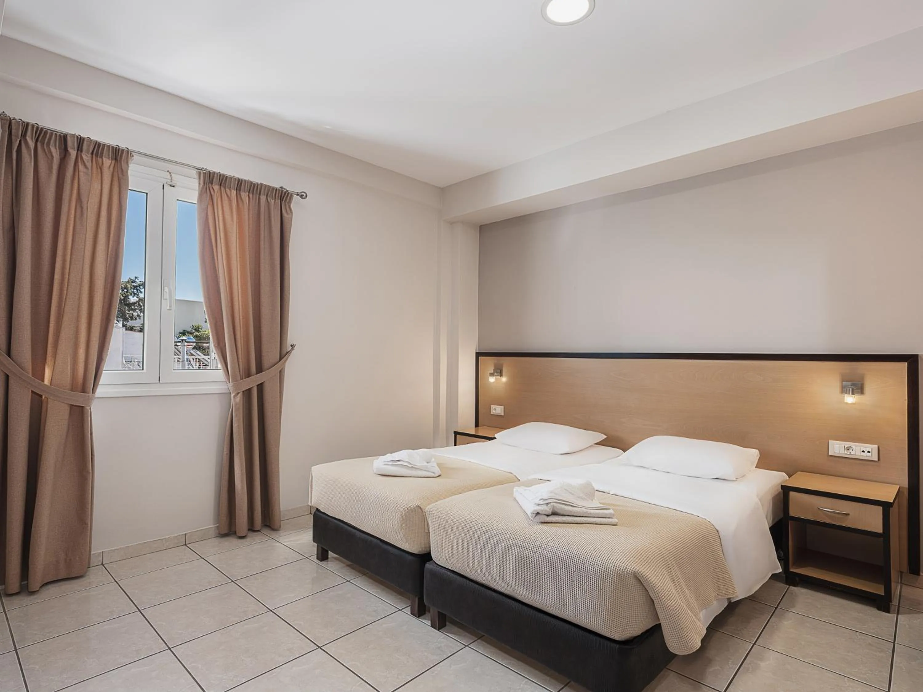 Bed in Theofilos City Hotel