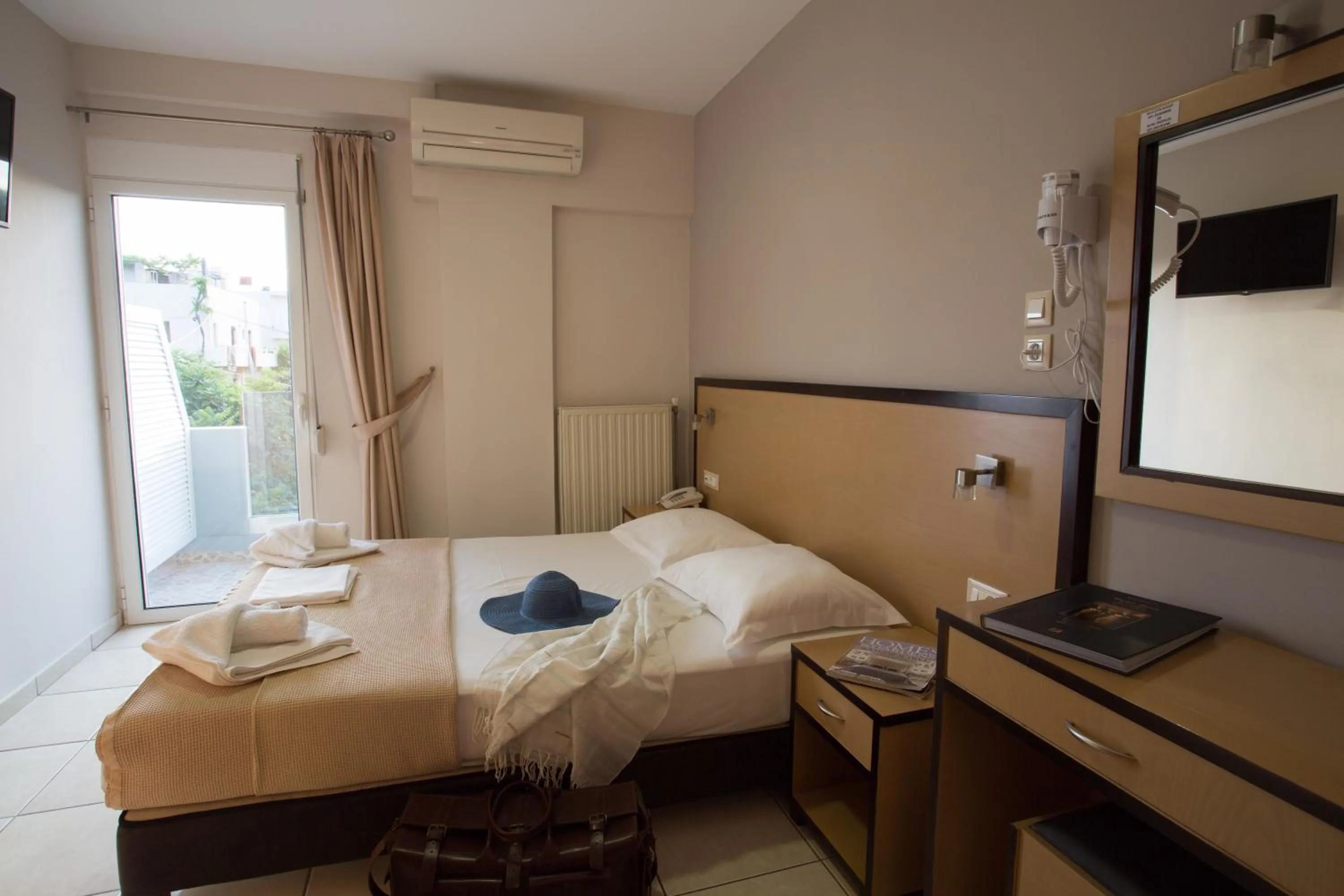 Photo of the whole room, Bed in Theofilos City Hotel