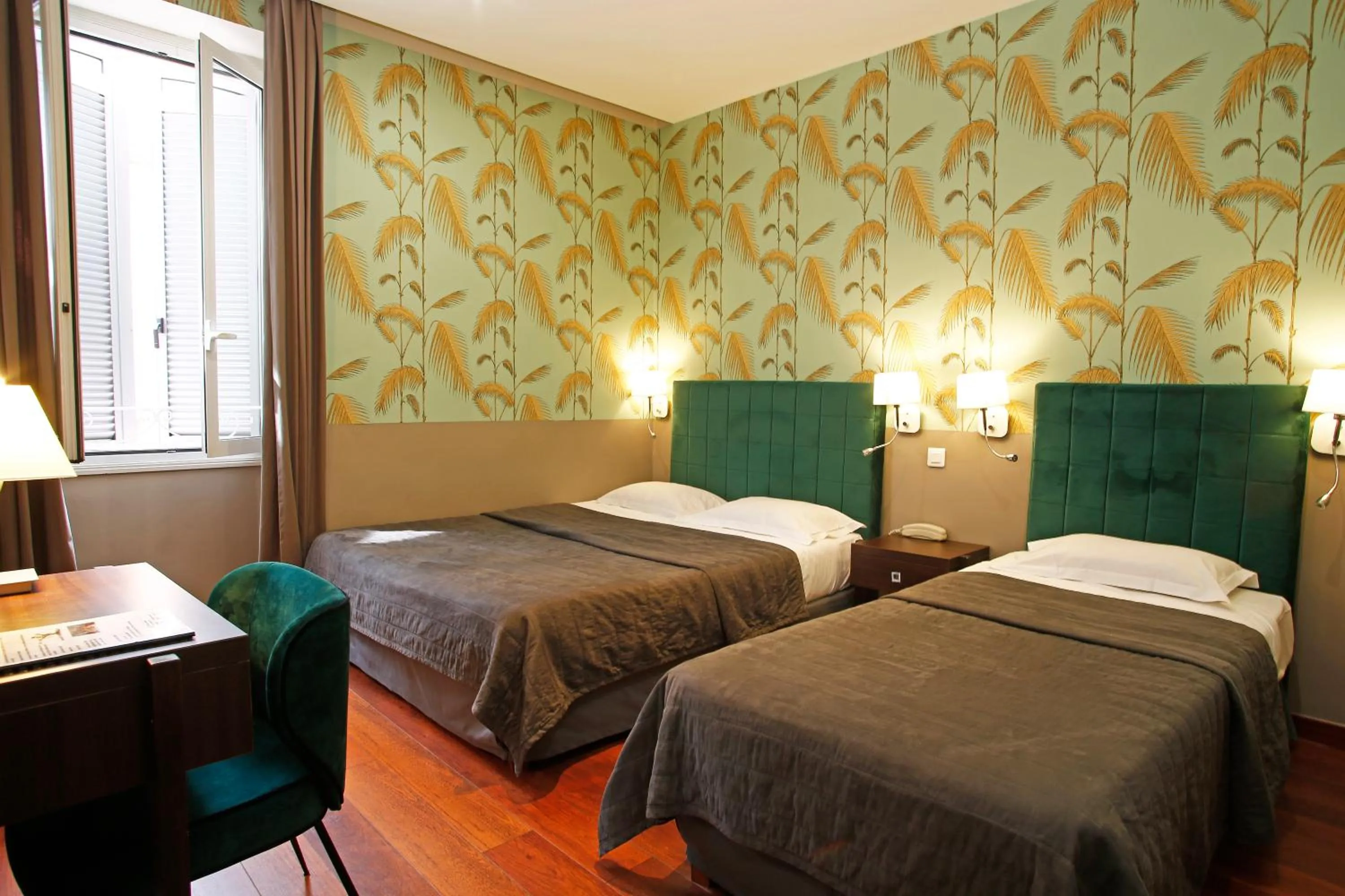 Bed in Hotel Restaurant Christophe Colomb